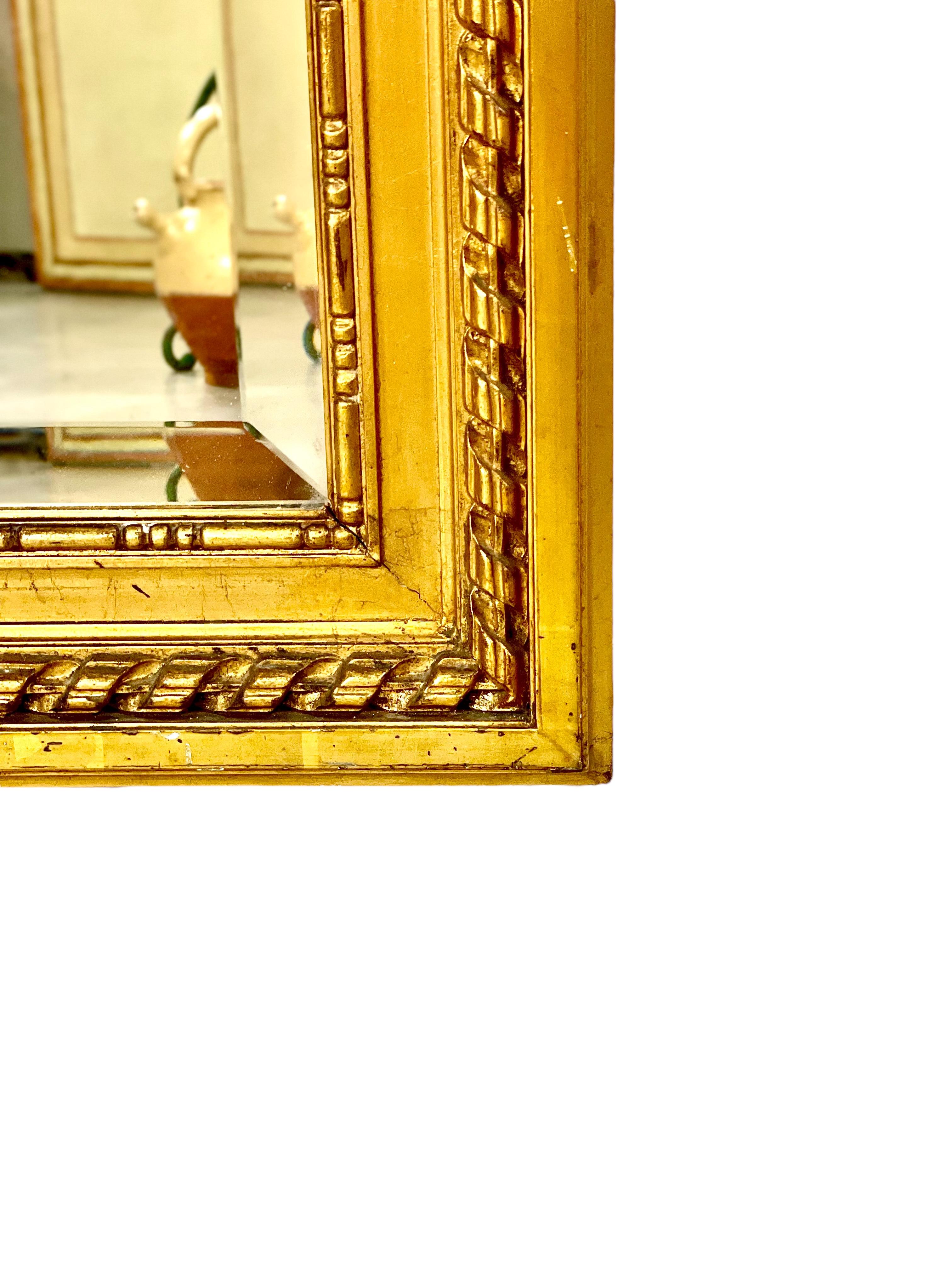  19th Century Louis XVI Trumeau Gilded Mirror with Mischievous Cherubs Design For Sale 5