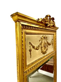 19th Century Louis XVI Trumeau Gilded Mirror with Mischievous Cherubs Design