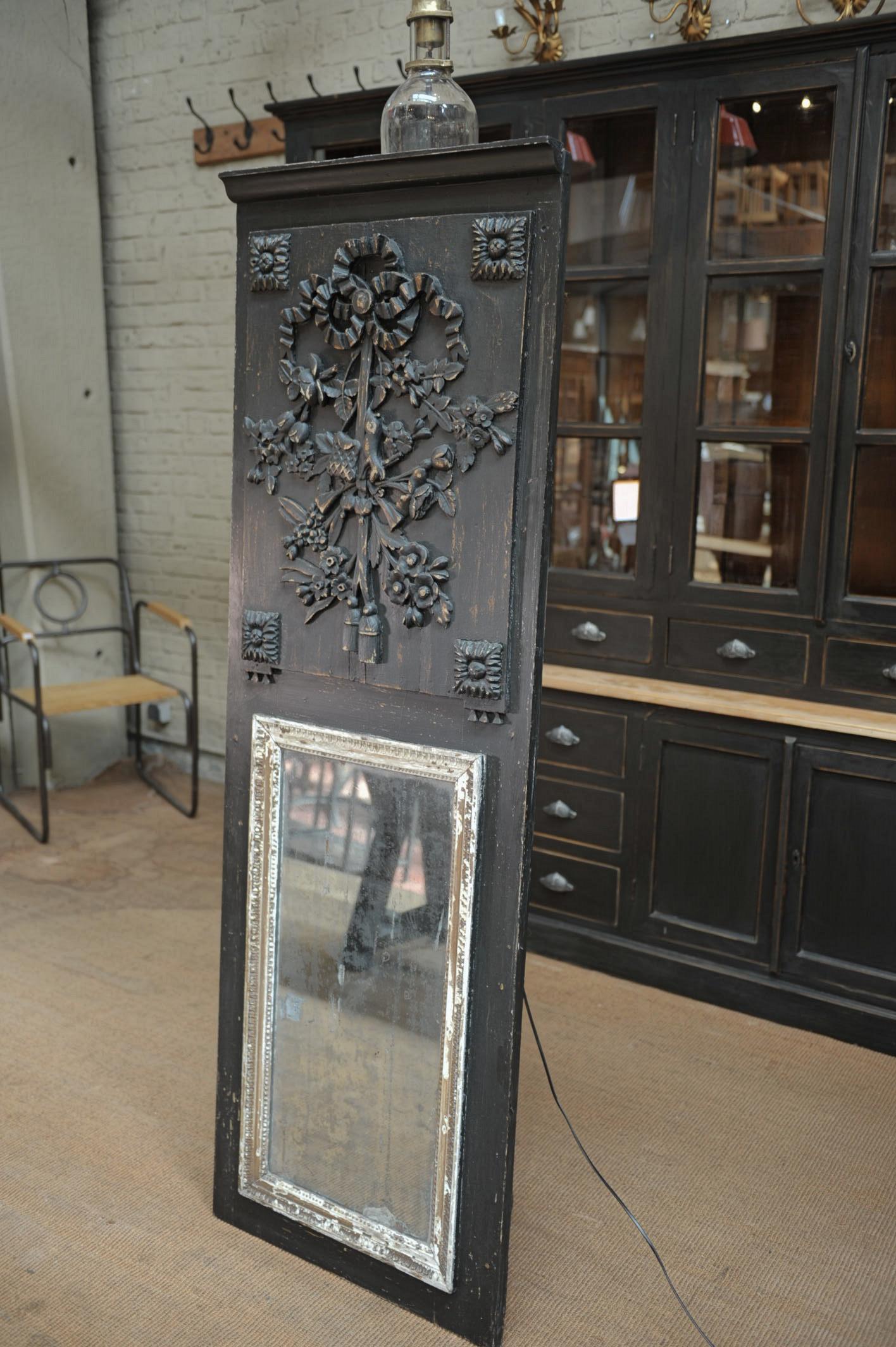 Louis XVI early 19th century wall mirror or trumeau , recent black patina.