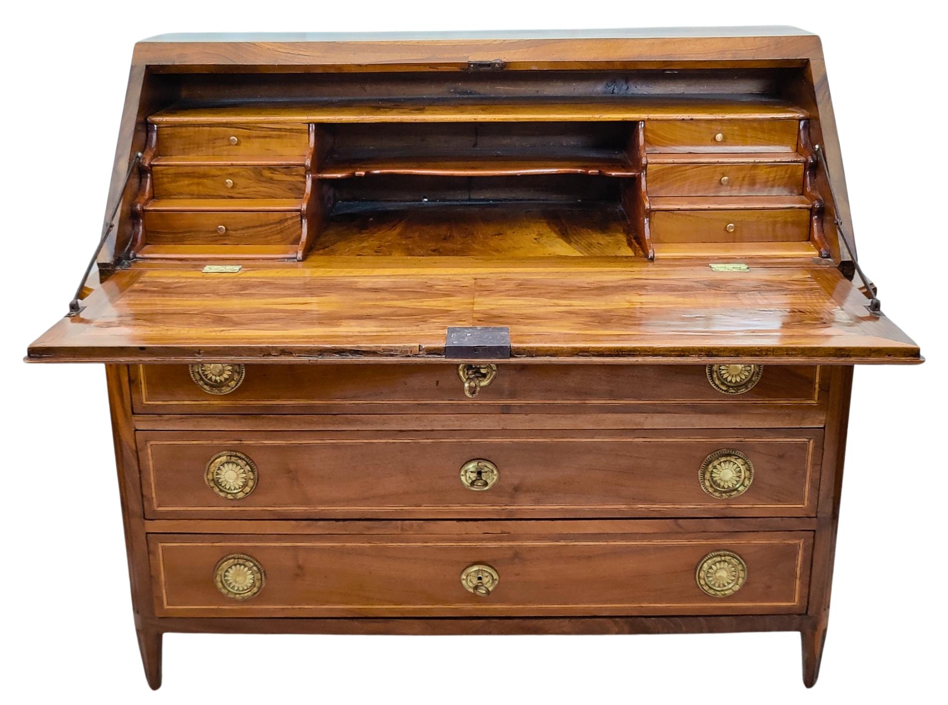 This Louis XVI walnut slant-front secretary desk is a fine example of 18th-century French craftsmanship and sophistication, ideal for collectors and interior enthusiasts seeking timeless elegance. Featuring a rich walnut veneer, this secretary desk