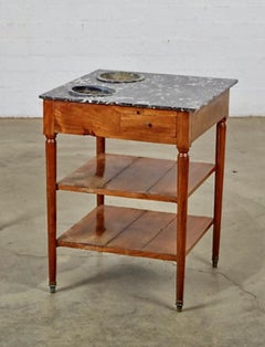 Rafraichissoir ou table à vin en noyer de style Louis XVI