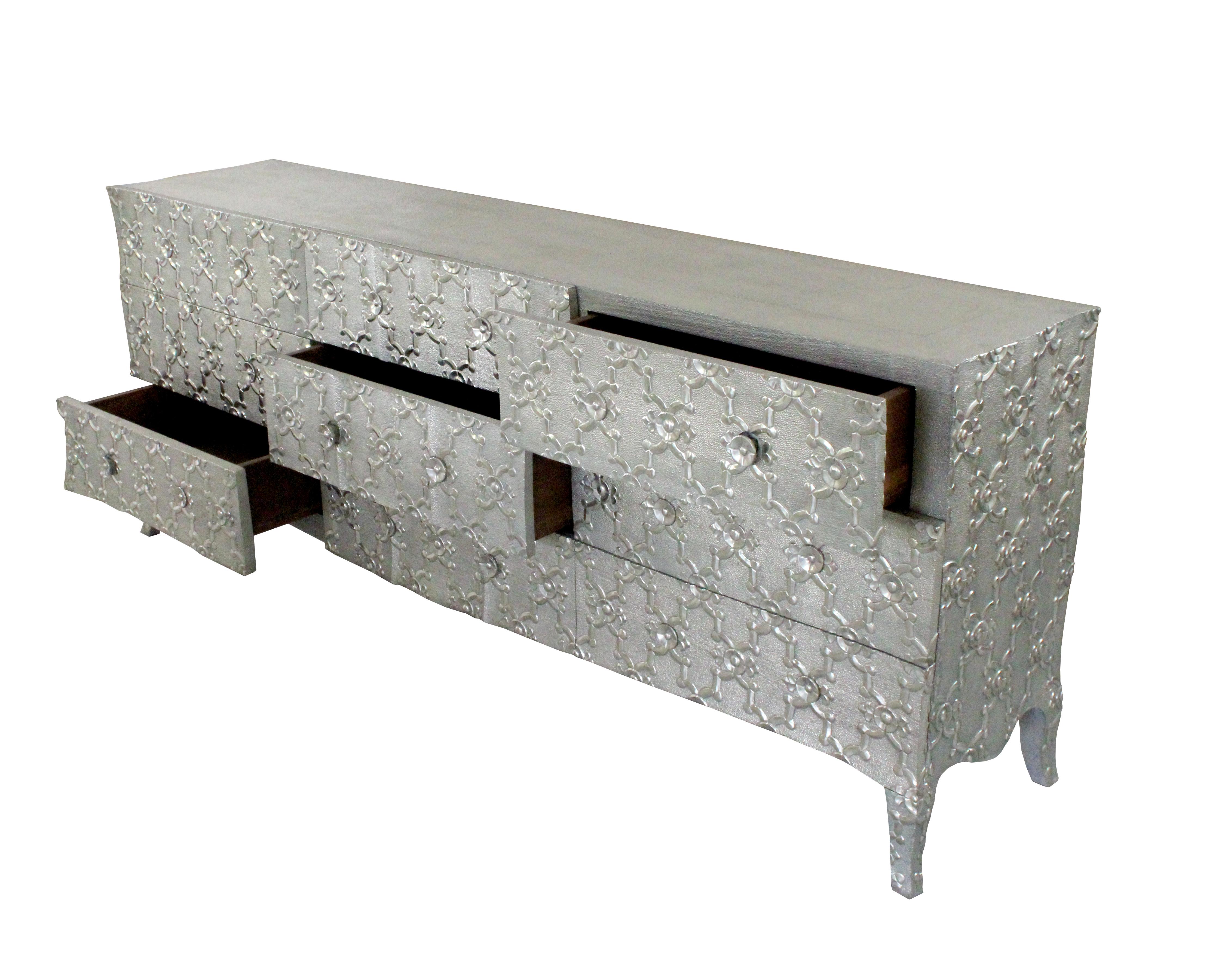 Mid Century Modern Dresser or Mid Century Modern Credenza Louis XVI Fleur De Lis in white bronze clad by renowned designer Paul Mathieu. This large Mid Century Modern Dresser or Mid Century Modern Credenza has got nine drawers with his