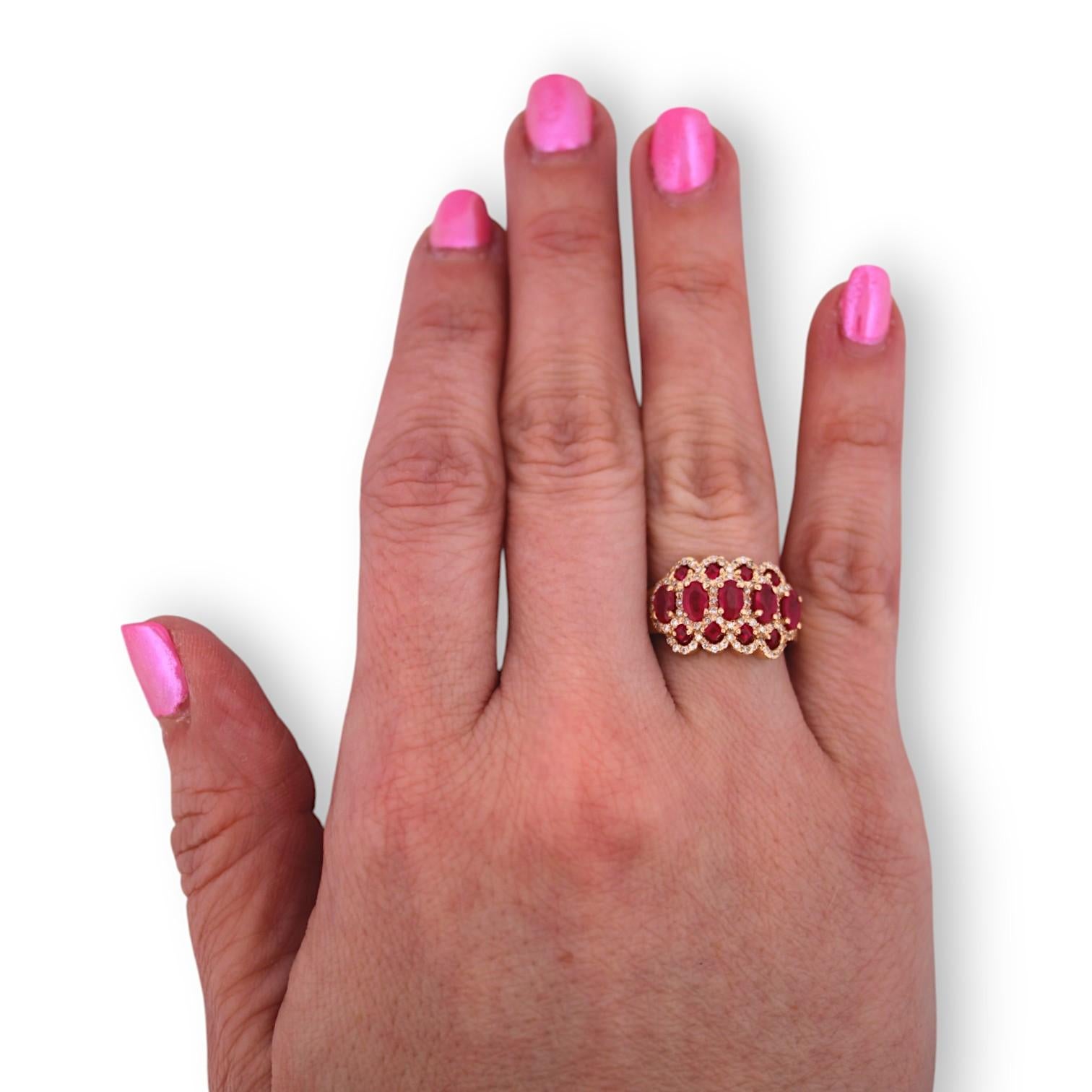 Fiery passion meets timeless sophistication in the Louisa Ring by Mountain Song Jeweler. This stunning piece features a 1.90 carat blend of natural oval and round rubies, rich in red hues that evoke love, strength, and undeniable confidence.