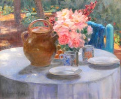 The table in the garden, flowers at tea time