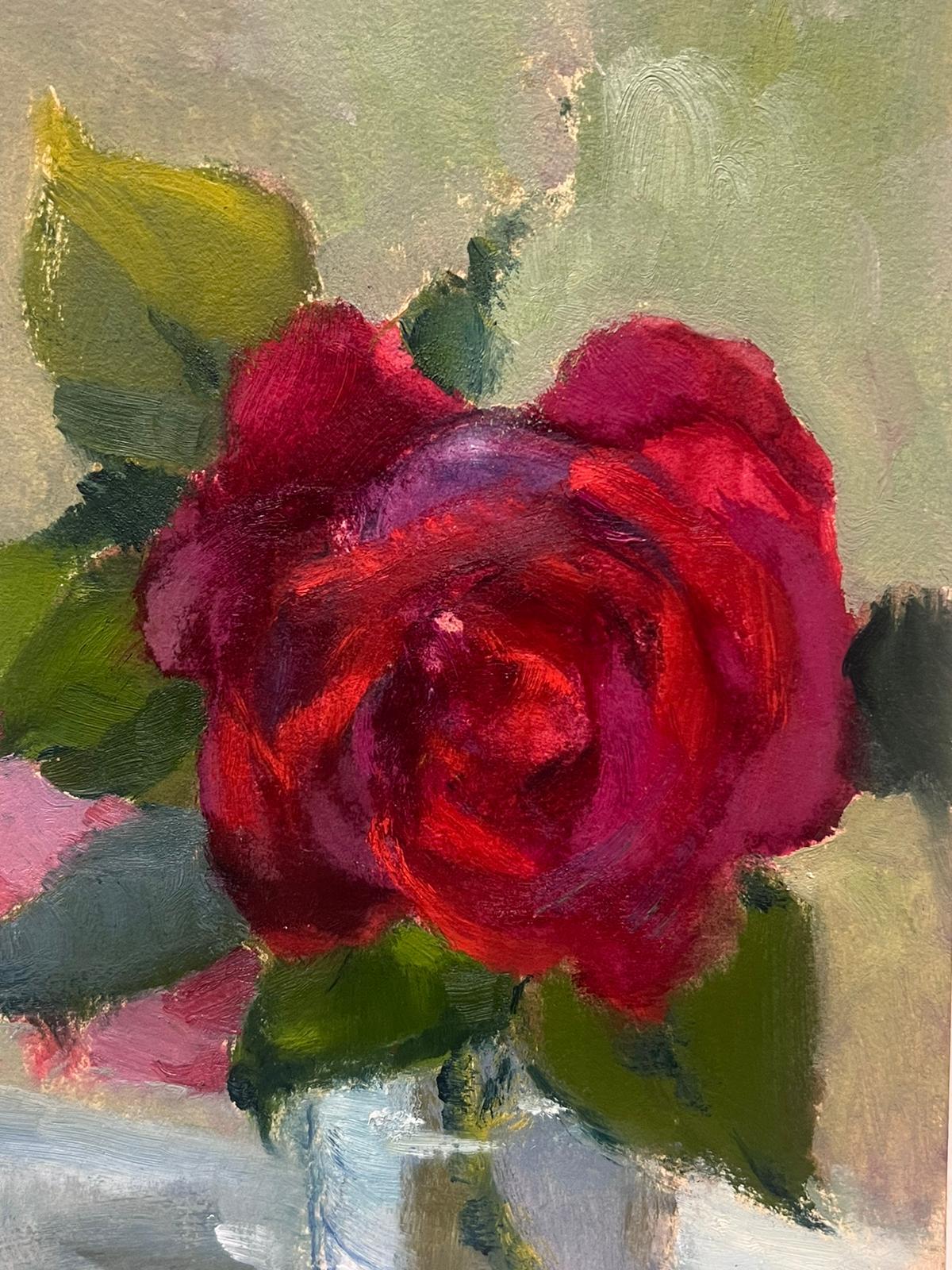 Red Rose
by Louise Alix (French, 1888-1980) *see notes below
provenance stamp to the back 
oil painting on board, unframed
measures: 7.5 high by 5 inches wide
condition: overall very good and sound, a few scuffs and marks to the surface and wear to