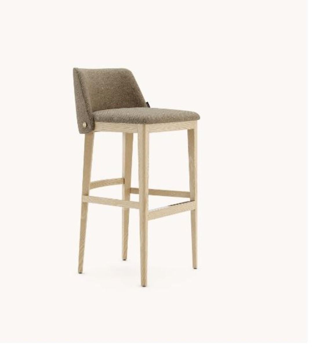 Louise Bar Chair by Domkapa
Materials: Fiber, Natural Ash, Steel. 
Dimensions: W 51 x D 50 x H 98 cm. 
Also available in different materials. Please contact us.

Designed to make a statement, Camille bar and counter chairs are the perfect