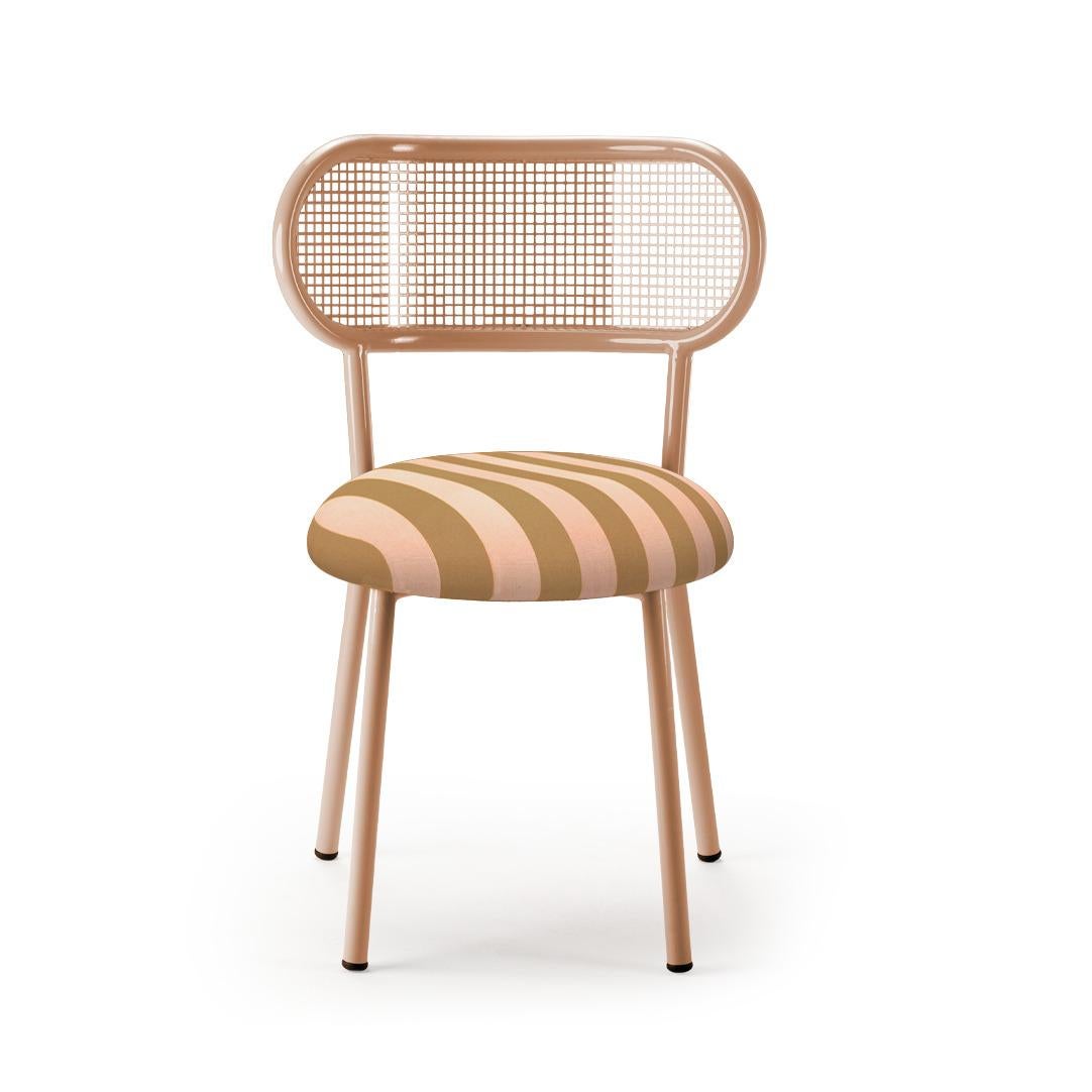 Intended for modern working, dining, and living, the Louise chair combines a clean,
steel structure, perforated steel back and upholstery resulting in an effortless modern classic that is perfectly proportioned.
The Louise chairs can evoke such
