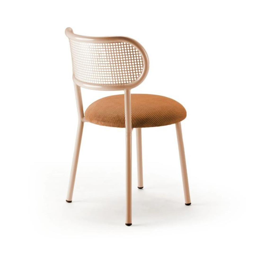 Intended for modern working, dining, and living, the Louise chair combines a clean,
steel structure, perforated steel back and upholstery resulting in an effortless modern Classic that is perfectly proportioned.
The Louise chairs can evoke such