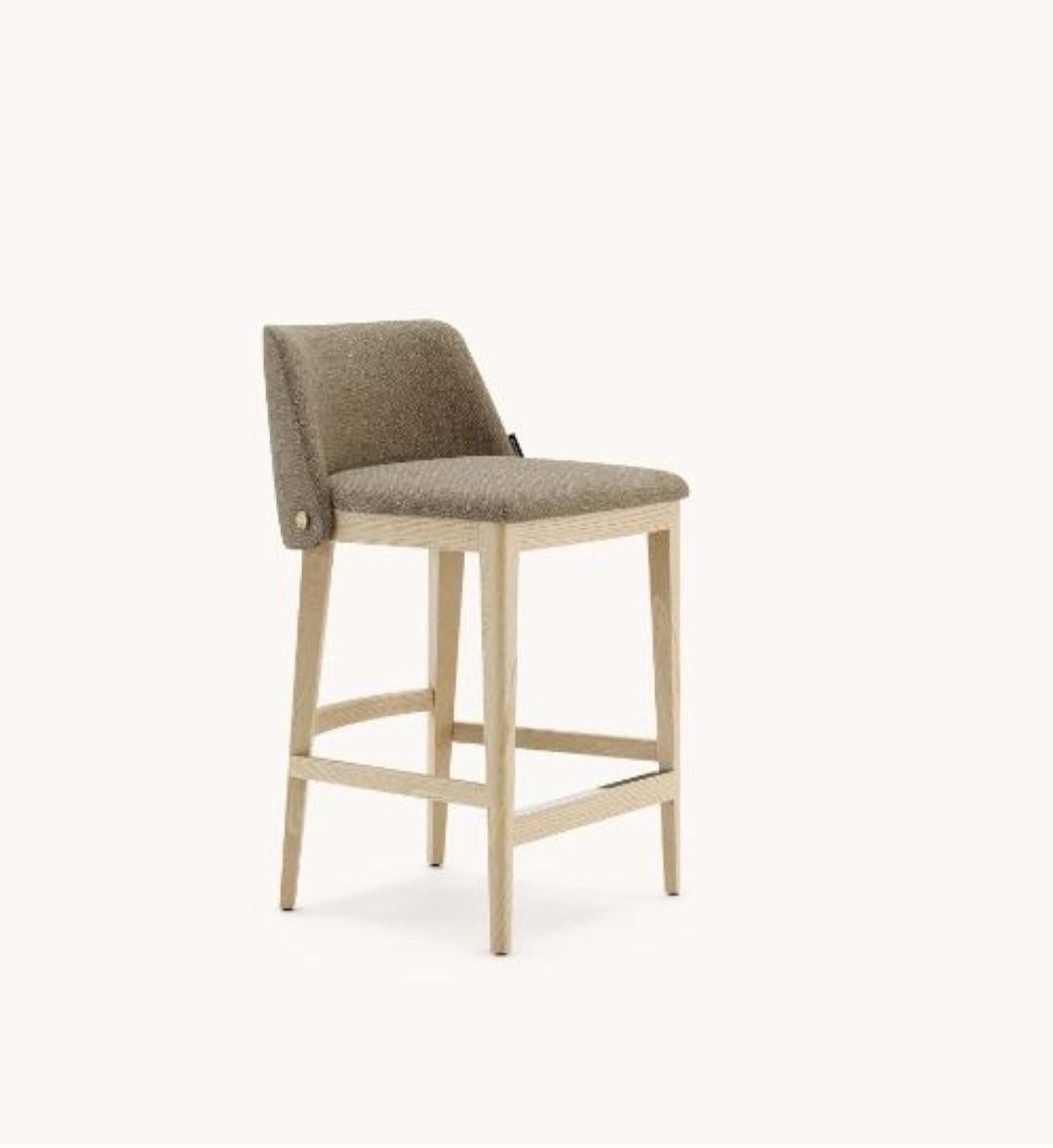 Louise counter chair by Domkapa
Materials: Fiber, Natural Ash, Steel. 
Dimensions: W 51 x D 50 x H 83 cm. 
Also available in different materials. Please contact us.

Designed to make a statement, Camille bar and counter chairs are the perfect