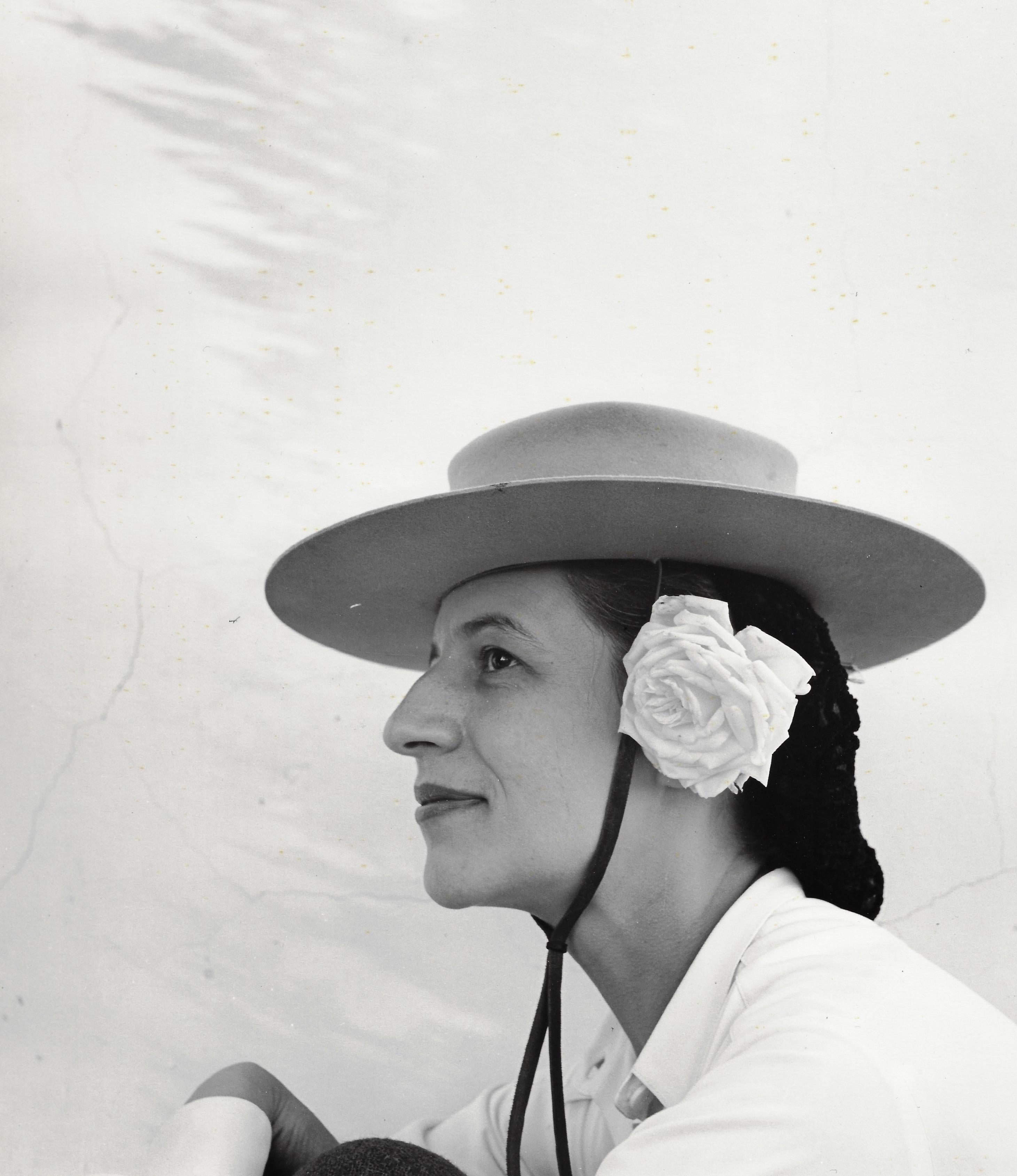 Louise Dahl-Wolfe Black and White Photograph - Diana Vreeland with Hat and Rose