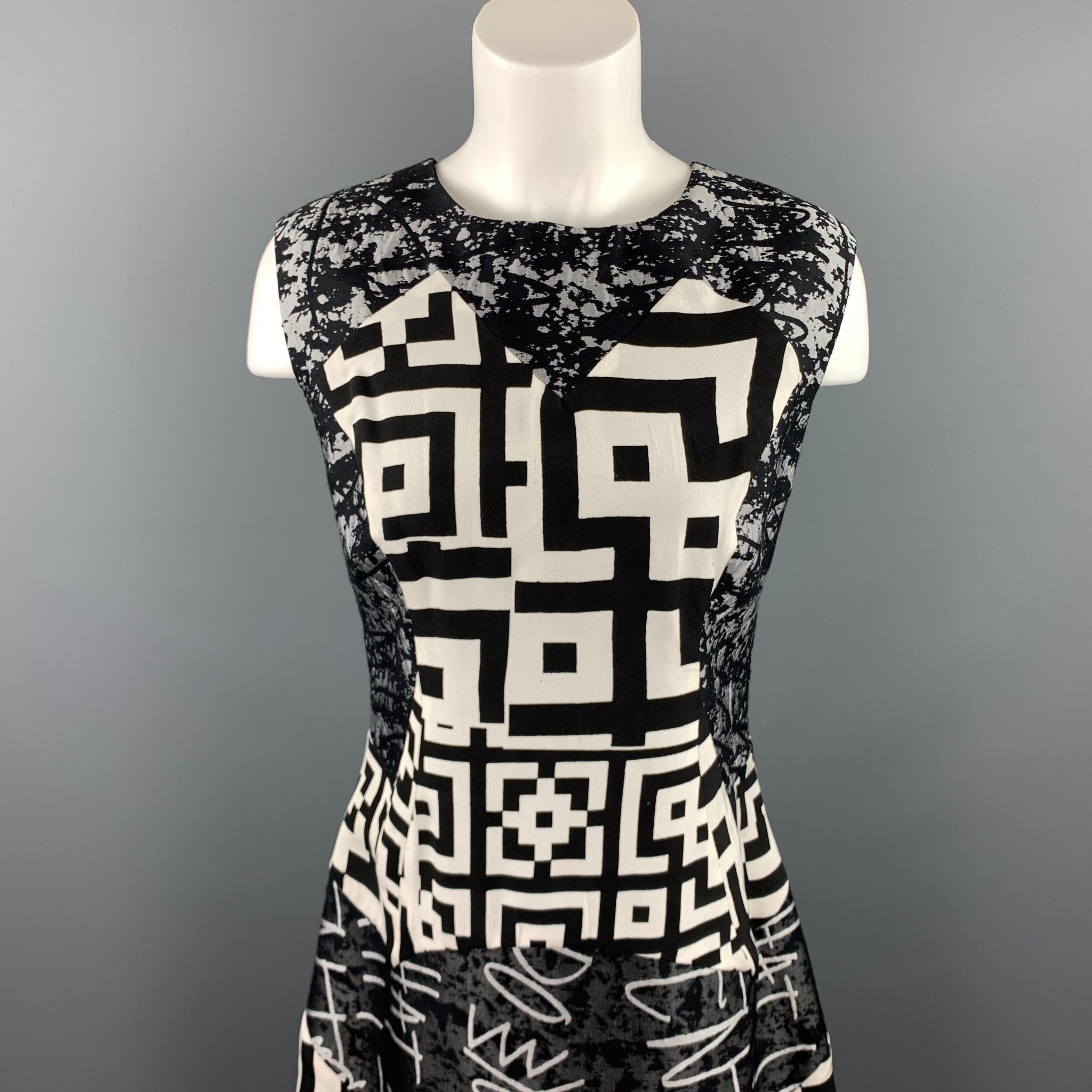 LOUISE GRAY dress comes in a gray wool / silk with an all over graphic print featuring a shift style and a back zip up closure.

Good Pre-Owned Condition.
Marked: 10

Measurements:

Shoulder: 16 in. 
Bust: 34 in. 
Waist: 32 in.
Hip: 40 in. 
Length: