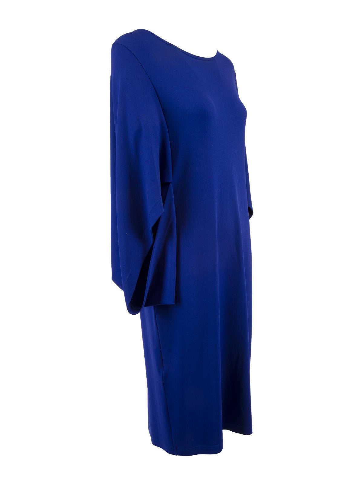 CONDITION is Very good. Minimal wear to dress is evident. Minimal wear to the neckline on this used Louise Kennedy designer resale item.  Details  Cobalt blue Viscose Modest style Bat wing sleeves Wide round neck Slip on Stretchy fabric   Made in