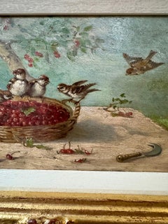 Gartenstillleben mit Spatzen und Kirschen in einem Garten