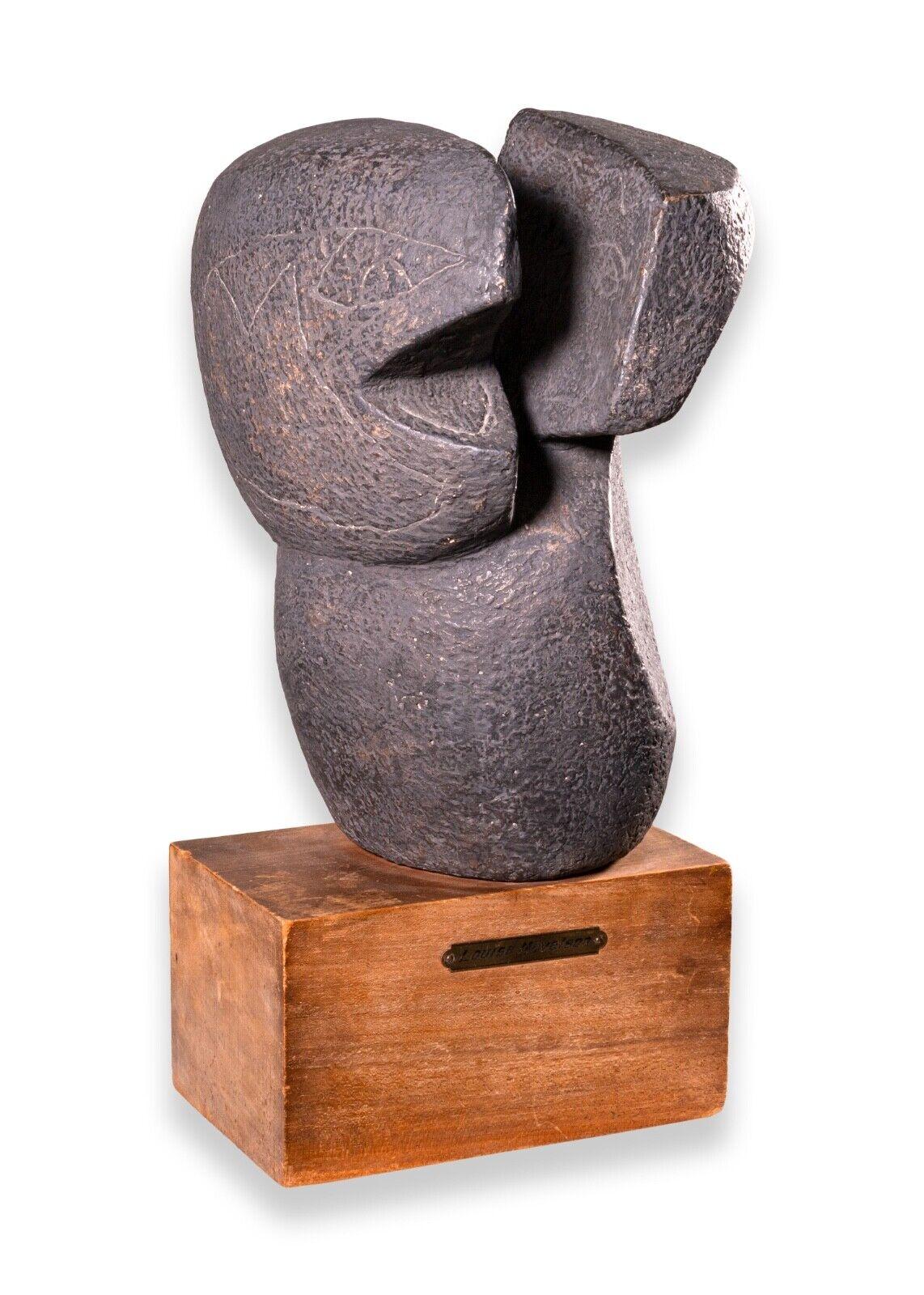 A unique abstract modern bronze sculpture by Louise Nevelson. On a wooden base with the name plaque. Original gallery and auction stickers on bottom of the base. The sculpture has a unique textural effect with small markings and a patina that is
