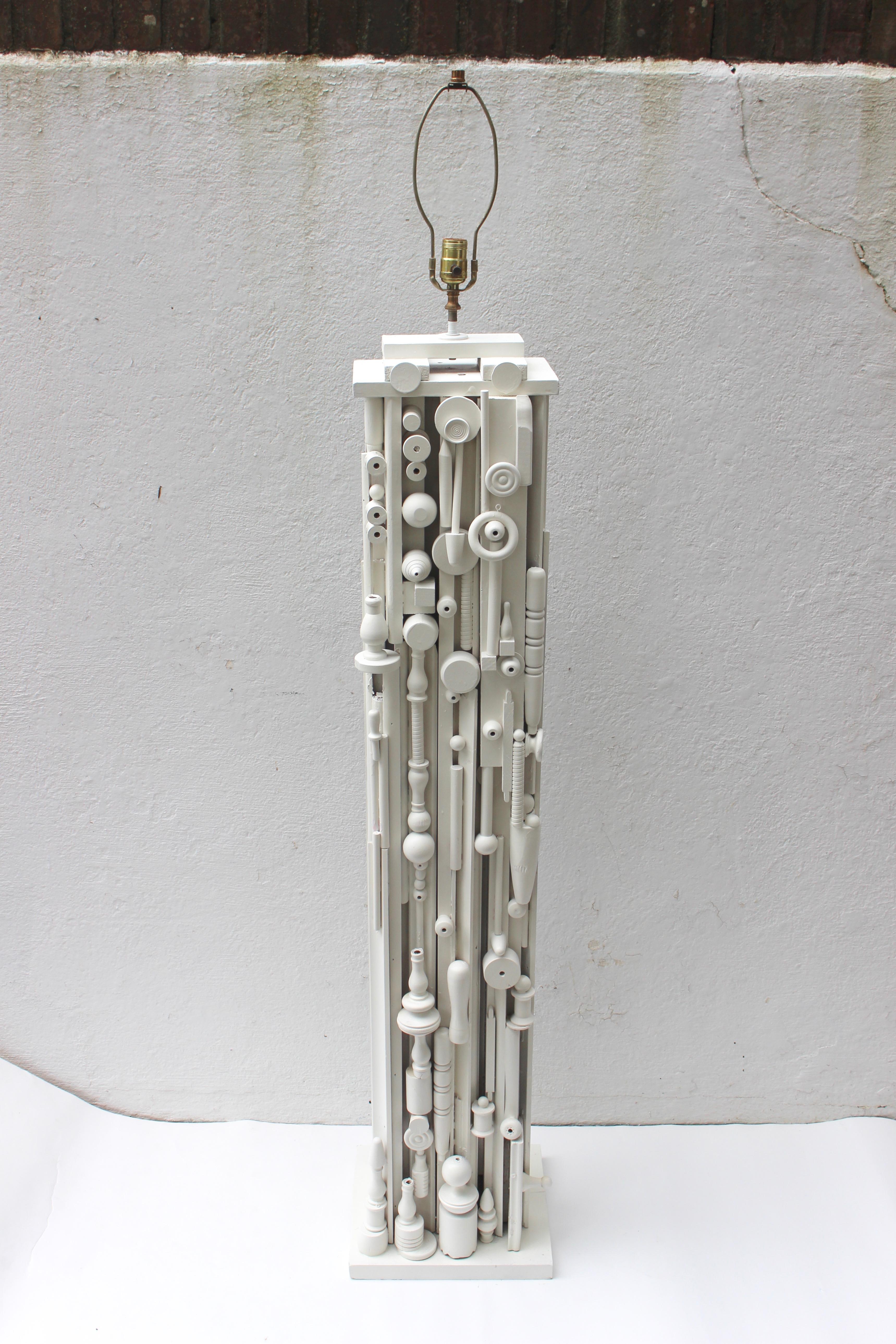Painted white Louise Nevelson style floor lamp.