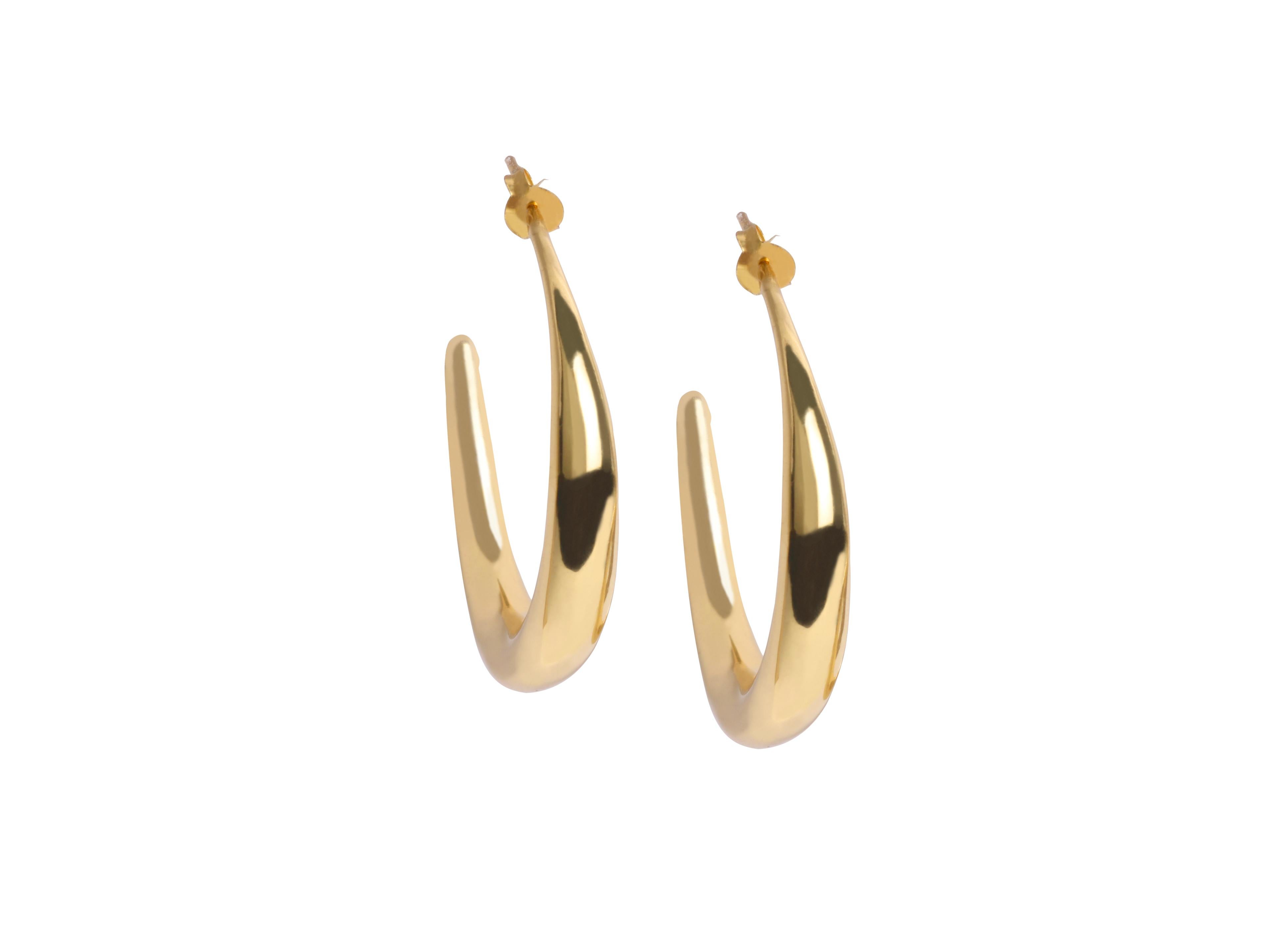 High polished 24 karat gold plated hoop earrings.

Louise Olsen's second personal collection explores the delicate nature of liquid and the intricate way in which it interacts with the body.

The collection has been designed in Sydney, Australia by