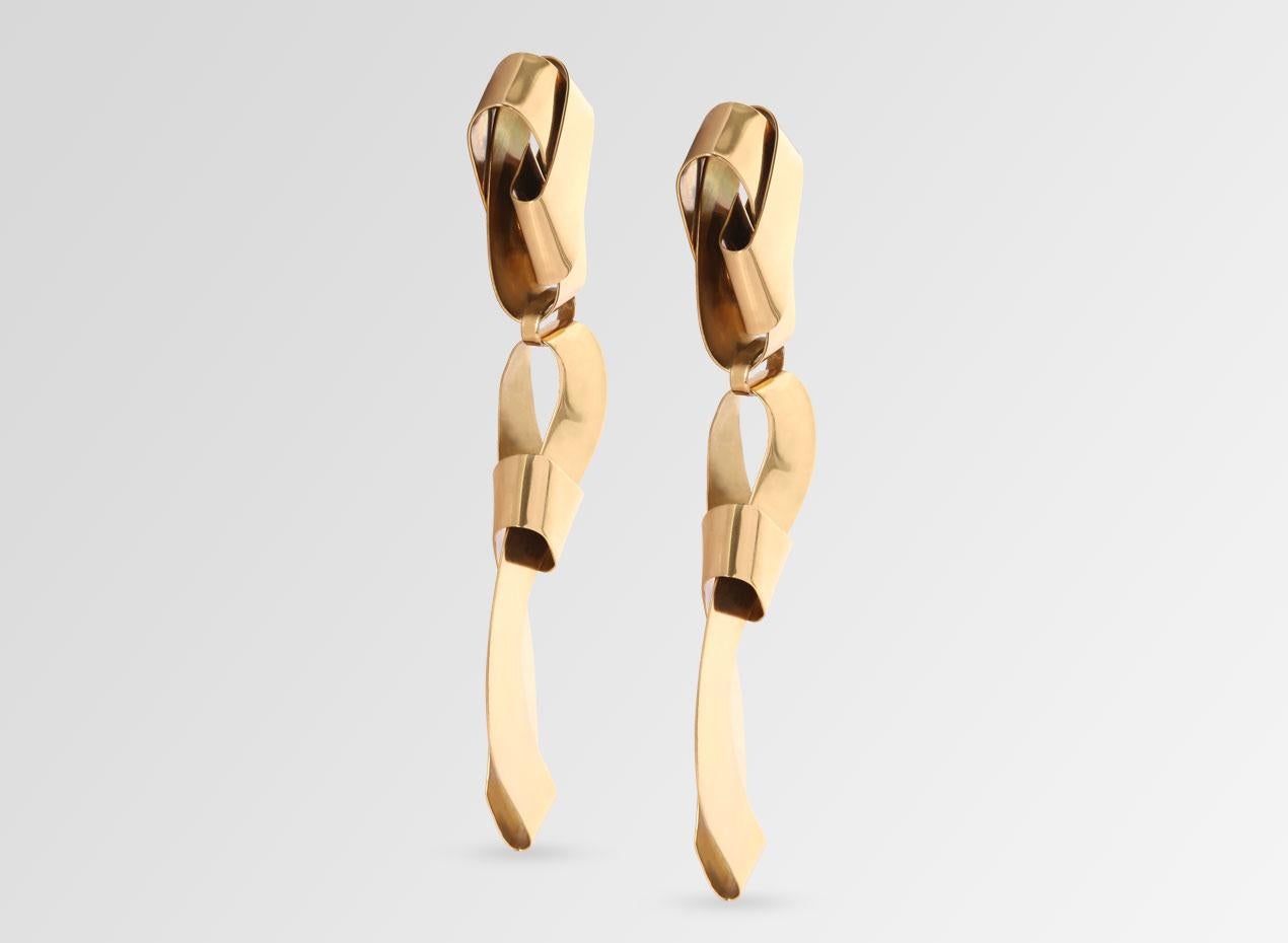 High polished 24 karat gold plated wrap stud earrings.

From the fourth series of jewellery designed by Louise Olsen for her personal collection, LO.

The collection has been designed in Sydney, Australia by Olsen; crafted from fine metals.