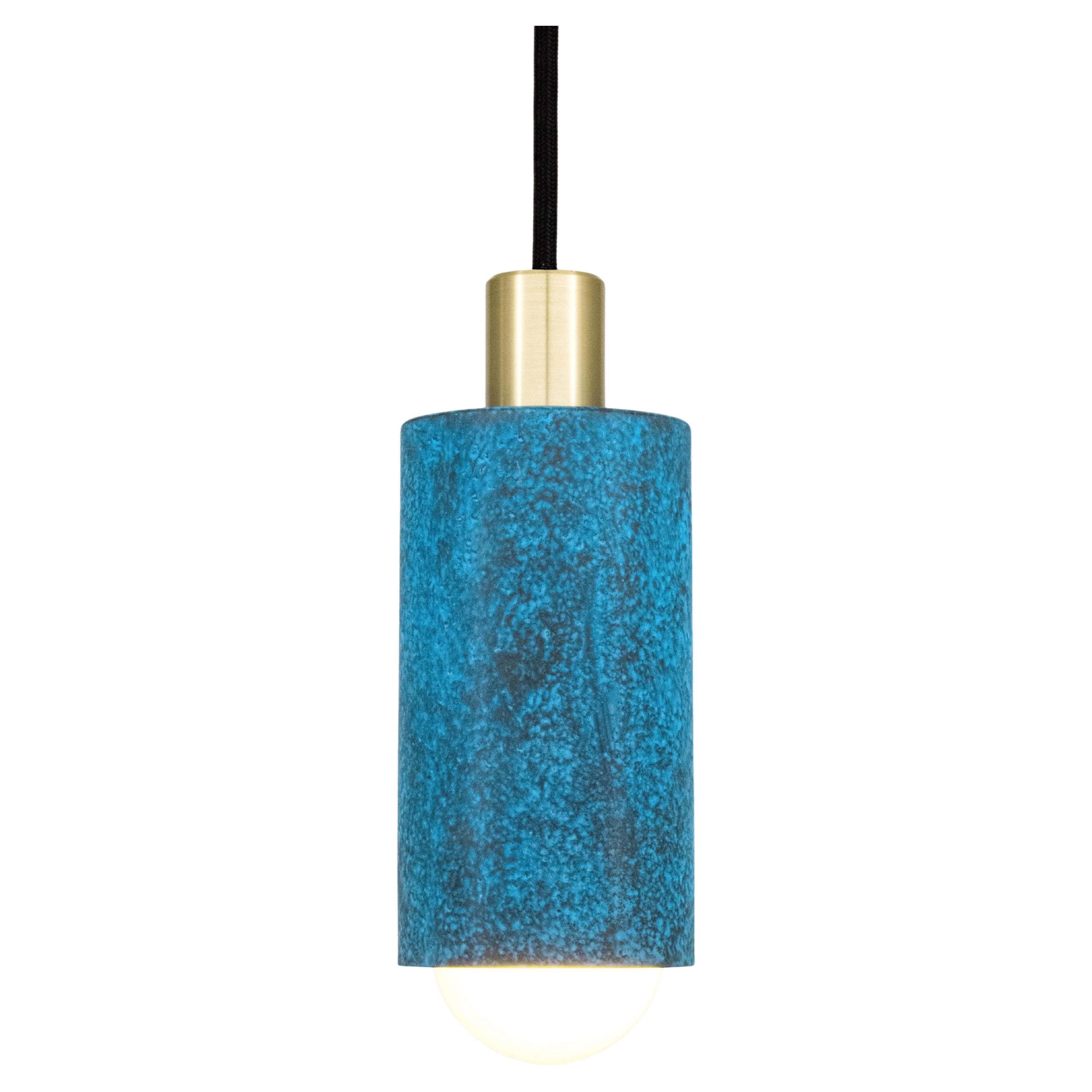 Produced by Trella’s skilled team of artisans, the Louise pendant light makes for perfect use over bars, nightstands, kitchen islands, or any space in need of a warm inviting glow. Featuring a cylindrical brass shade patinated in Trella’s signature