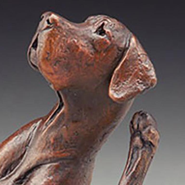 Sculpture of a dog with it's back leg lifted to scratch behind the ear. 
Ed. 5/99