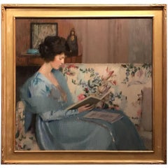 Portrait of a Woman Reading a Book on a Sofa
