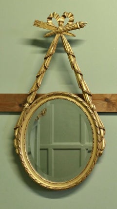 LouisXVI Style Gilt Ribbon and Bow Mirror Oval Mirror  A superb piece