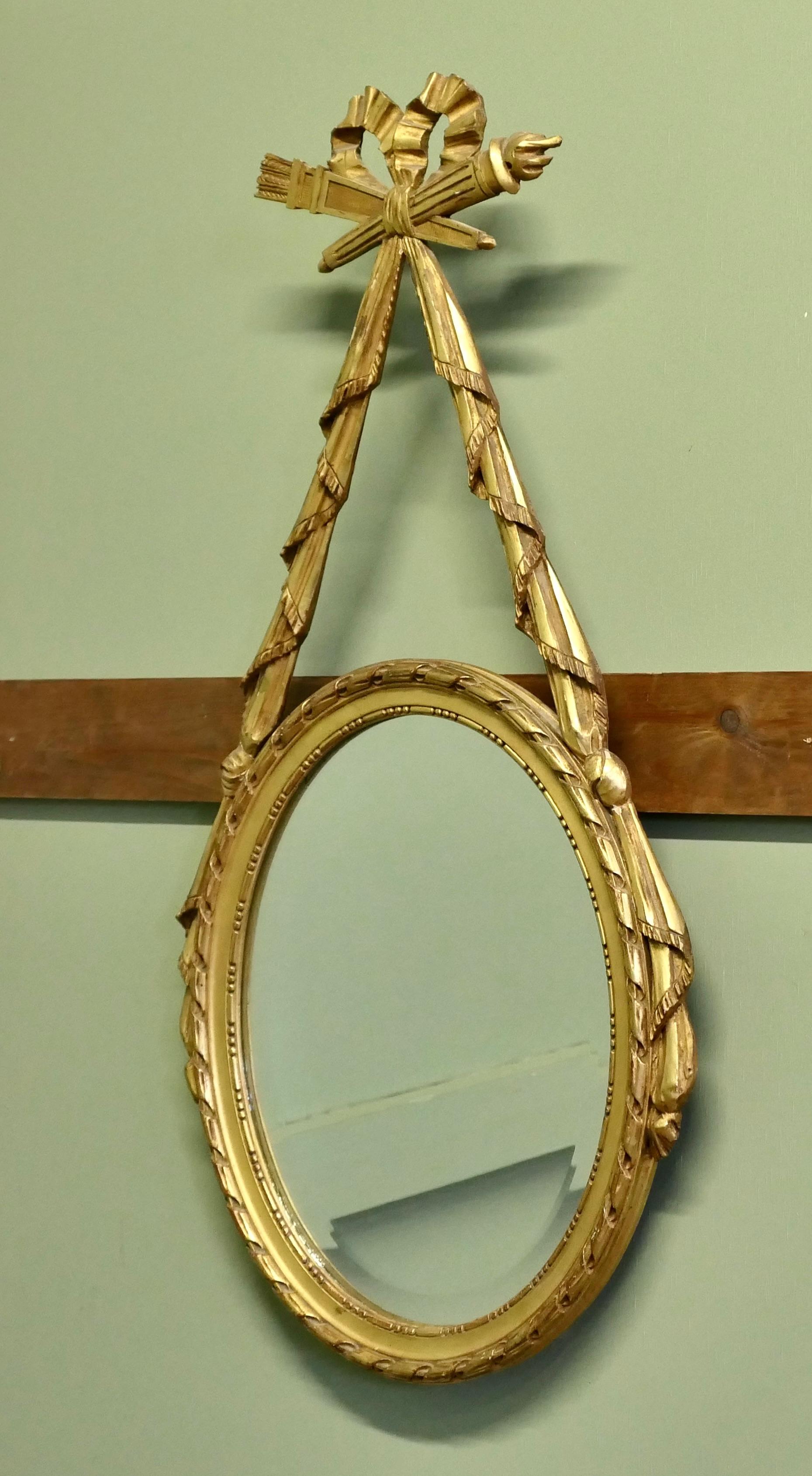 LouisXVI Style Gilt Ribbon and Bow Mirror Oval Mirror  A superb piece In Good Condition For Sale In Godshill, Isle of Wight