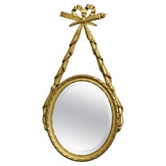 LouisXVI Style Gilt Ribbon and Bow Mirror Oval Mirror  A superb piece
