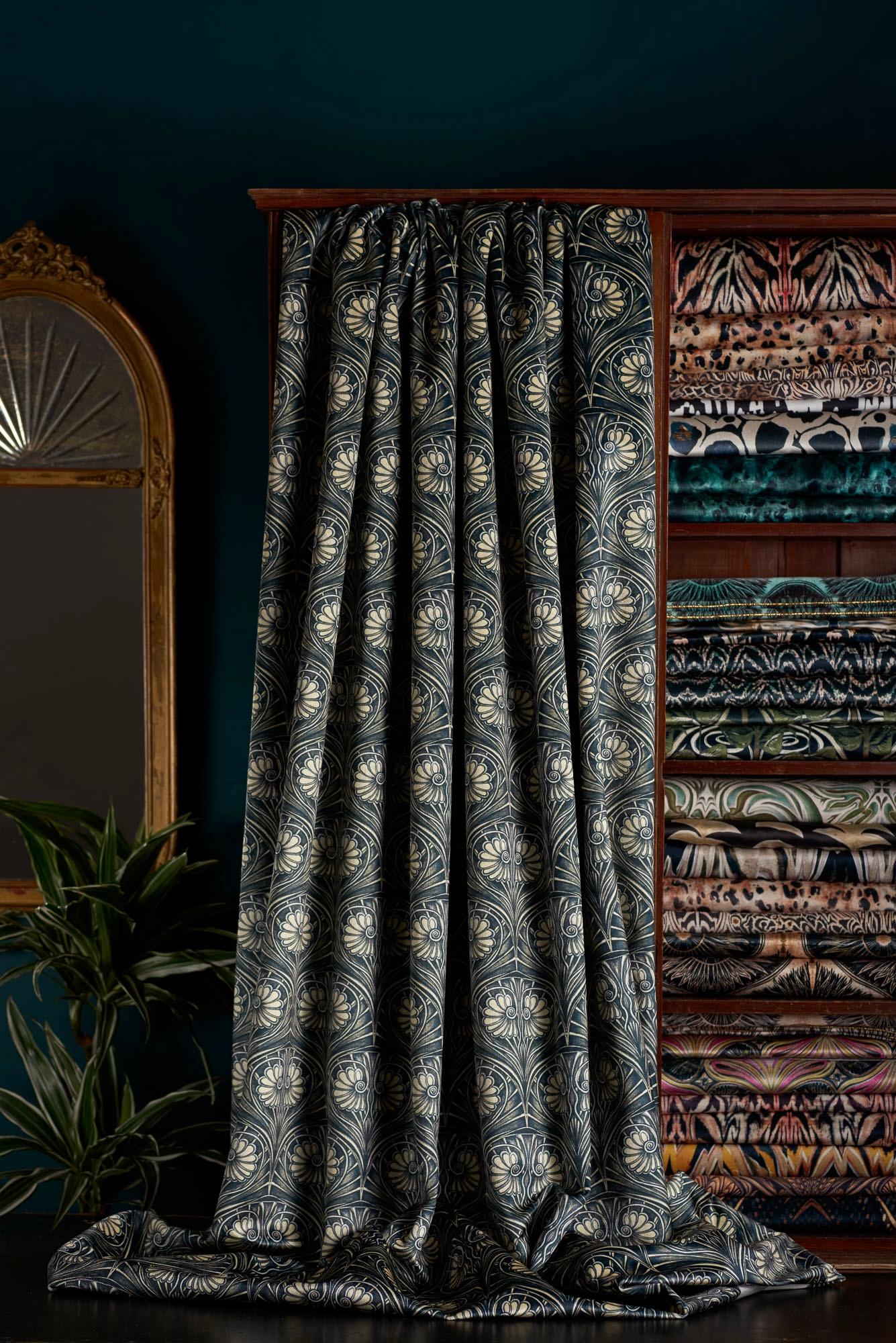 A beautifully soft black and soft gold tone pattern on sensuous velvet. Picking up on Anna’s love of Art Nouveau, this design was hand painted, a feminine floral motif inside a scallop shell.

This velvet is midweight, with a strong straight woven