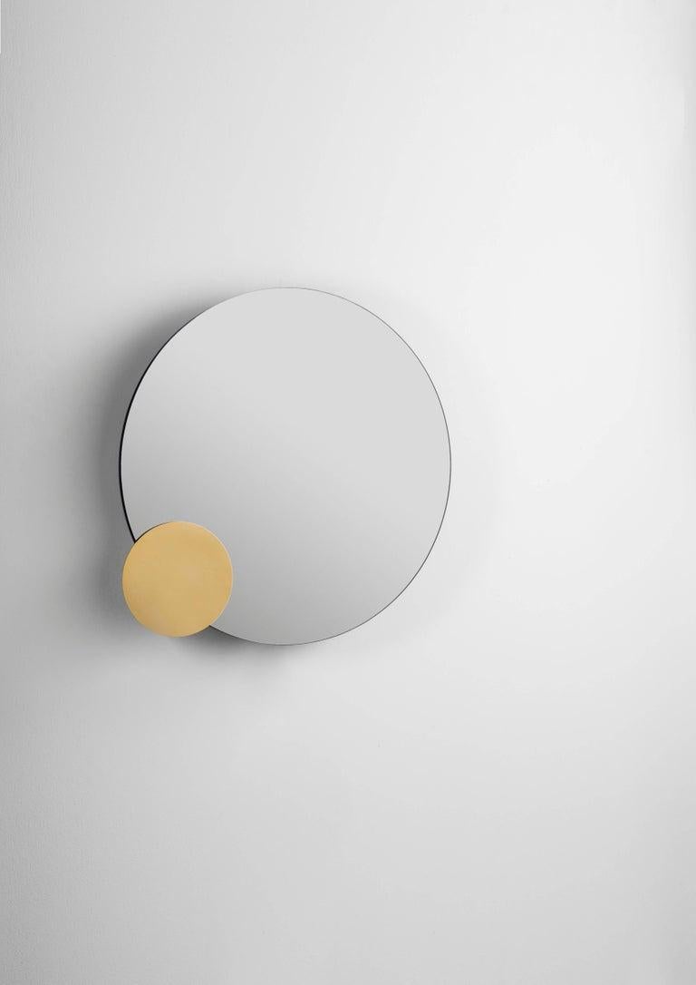 Mirror model lunar tale designed by Loulwa Al Radwan.
Manufactured by BD Barcelona Design.

Blue and grey mirrors, and a gold-plated aluminium disc. MDF box lacquered in black. Precise movement system with steel bearings, rack and
