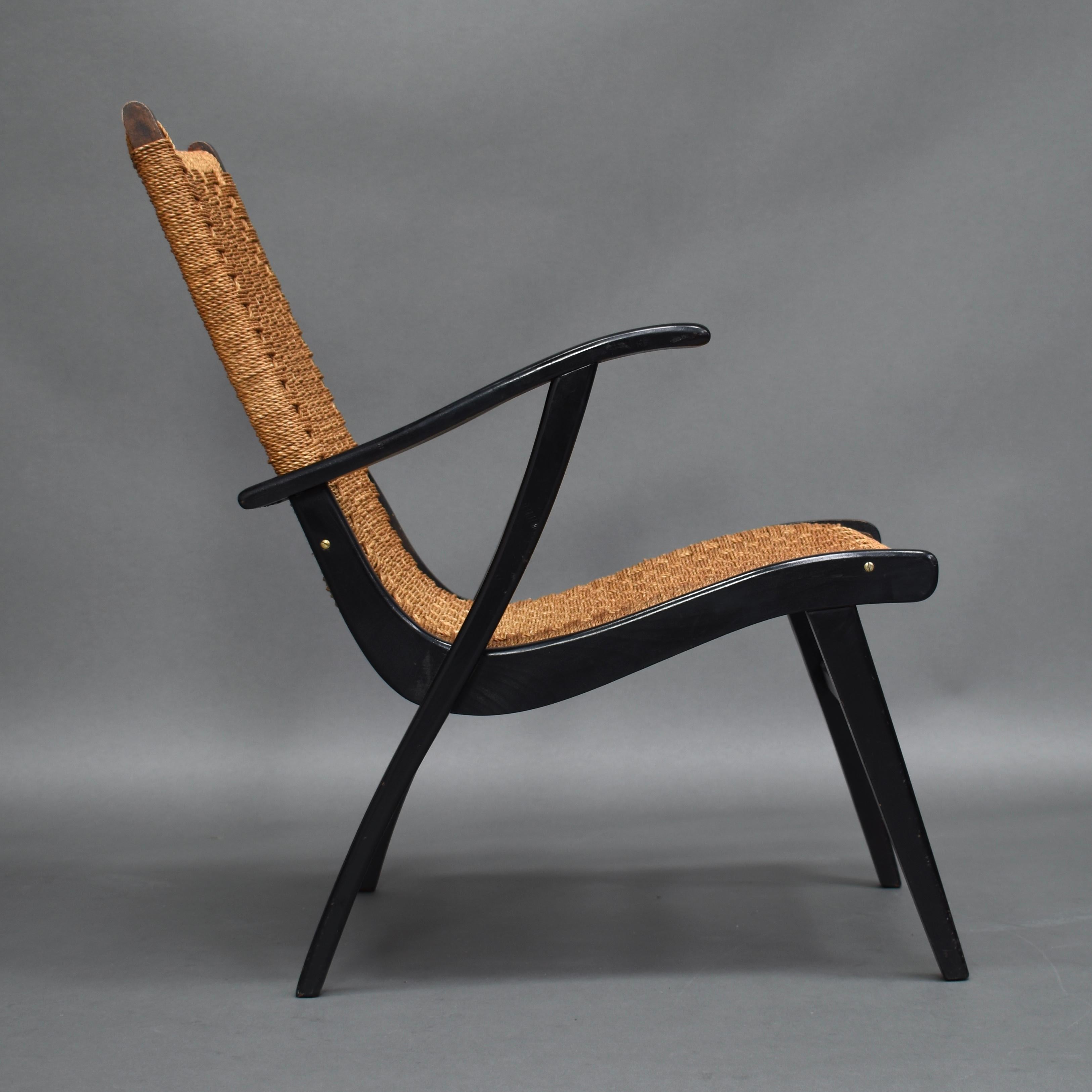 Midcentury lounge chair by the former Dutch warehouse Vroom & Dreesman (V&D), Netherlands, 1957.

Designer: Unknown

Manufacturer: Vroom & Dreesman

Country: Netherlands

Model: Lounge chair

Design period: 1957

Date of manufacturing: