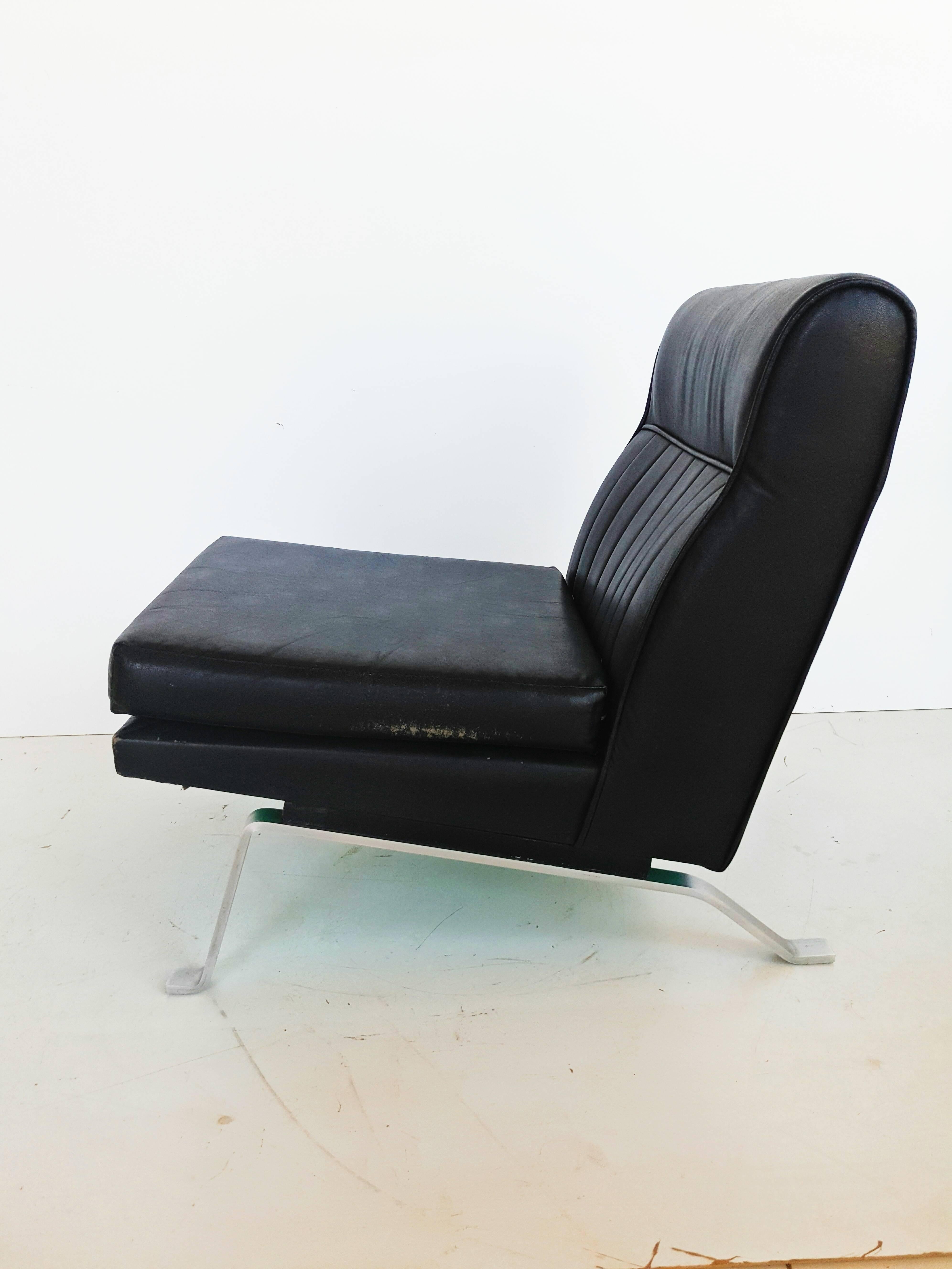 Beautiful lounge armchair manufactured in France in 1960s, original black leatherette. Very good vintage condition.