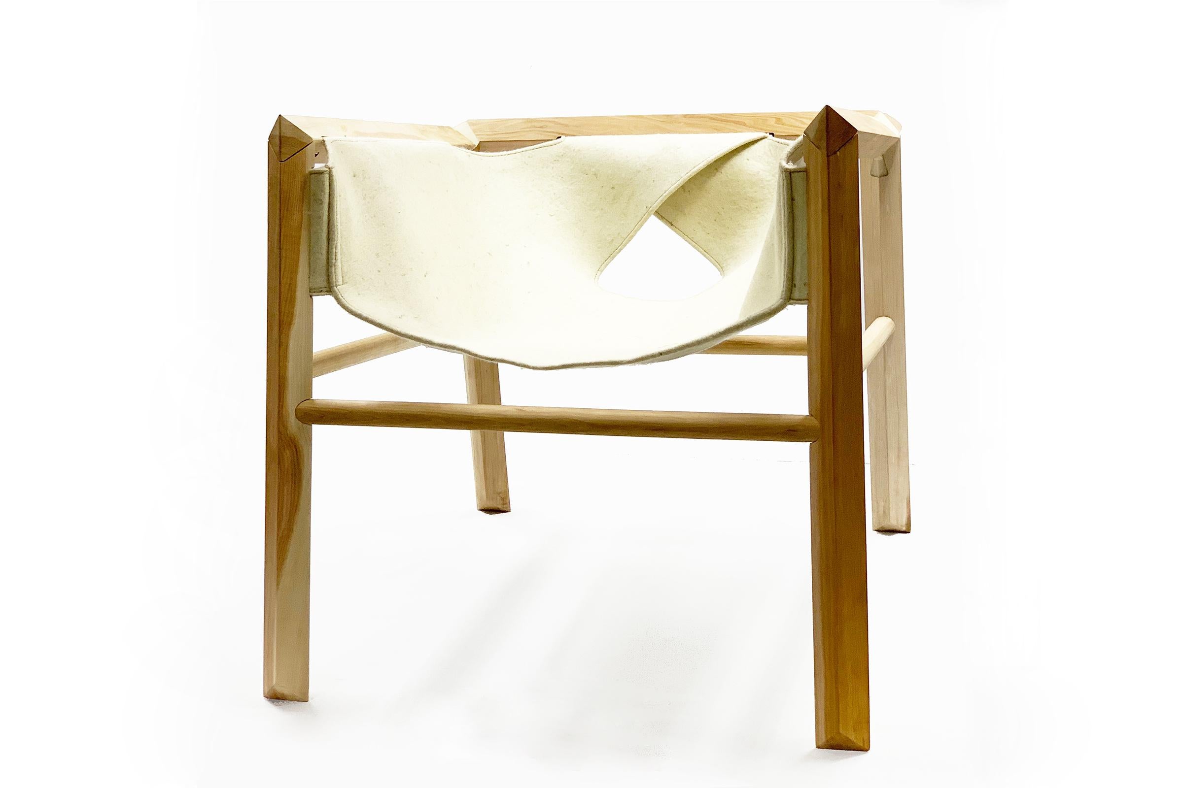 Minimalist Lounge armchair in Lenga wood and wool felt seat For Sale