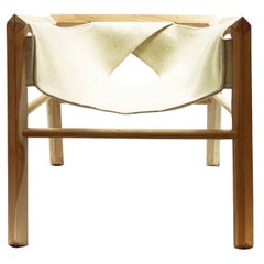 Lounge armchair in Lenga wood and wool felt seat