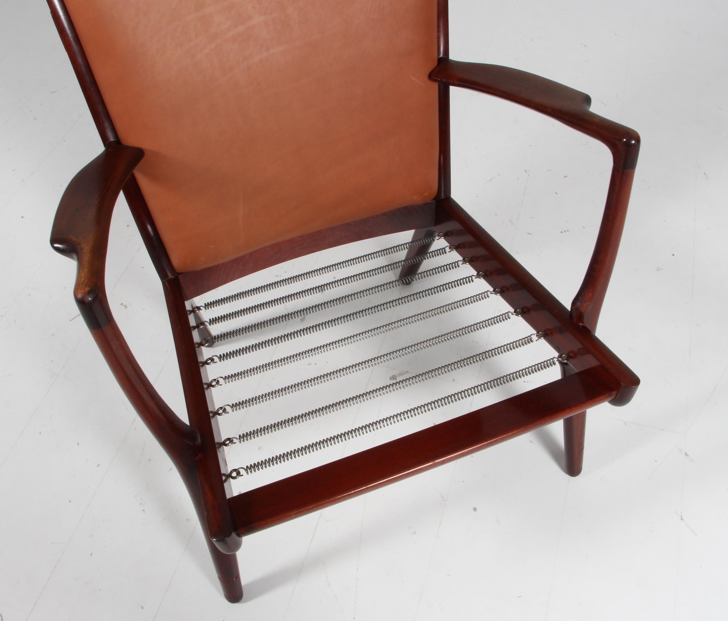 Late 20th Century Lounge / armchair, Model AP16, by Hans Wegner for A.P. Stolen. Full grain