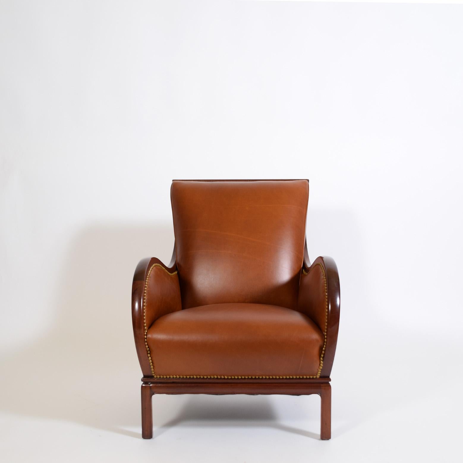 Danish lounge by by Frits Henningsen.  the Bugatti chair For Sale