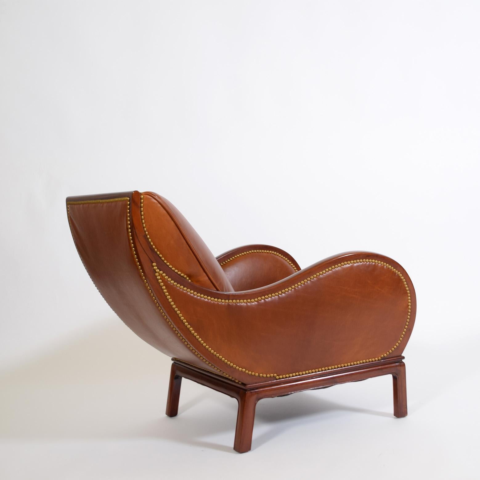 Mid-20th Century lounge by by Frits Henningsen.  the Bugatti chair For Sale