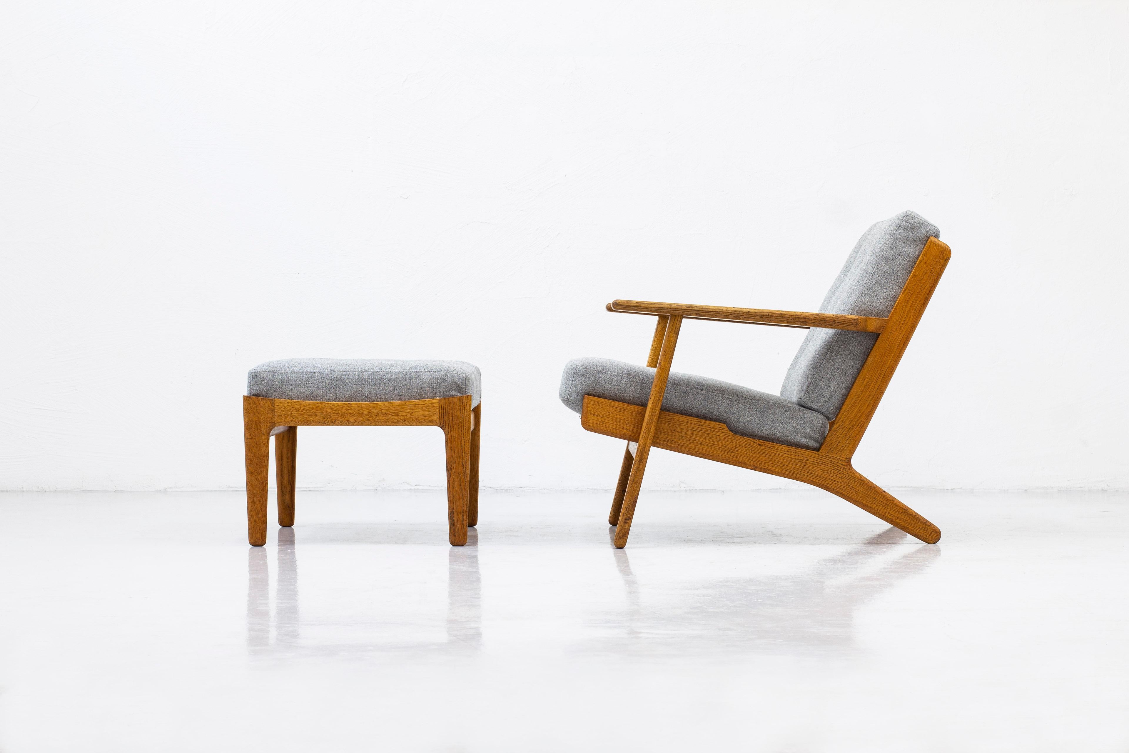 Scandinavian Modern Lounge Chair and Ottoman by Hans J. Wegner for GETAMA, Denmark, 1960s