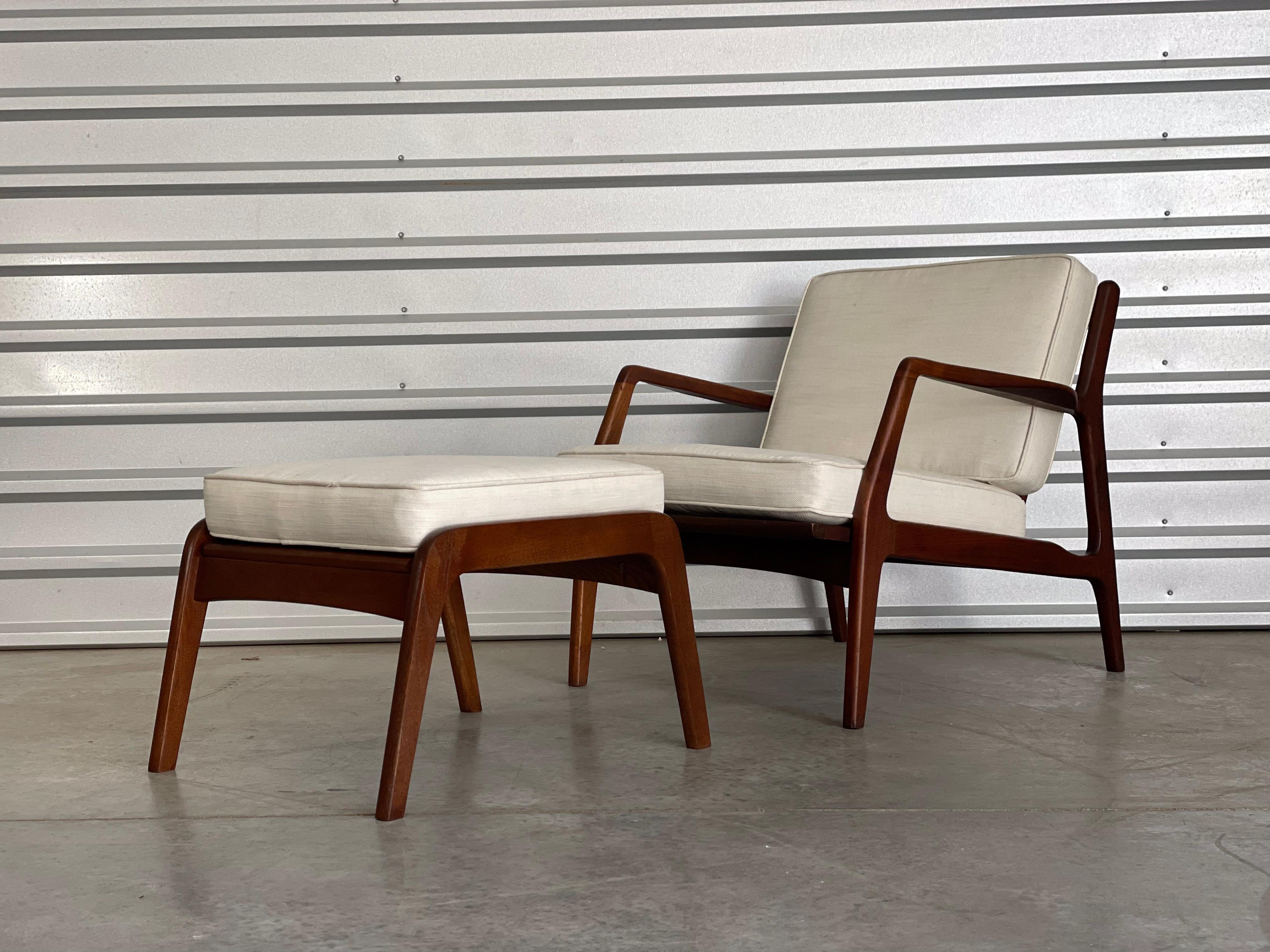 Classic American Modern 1950's lounge chair & ottoman by Lawrence Peabody for Selig; 1950's. This chair is rarely seen with the ottoman. The ottoman is refinished with new rubber straps and cushion. The lounge chair is in original condition with