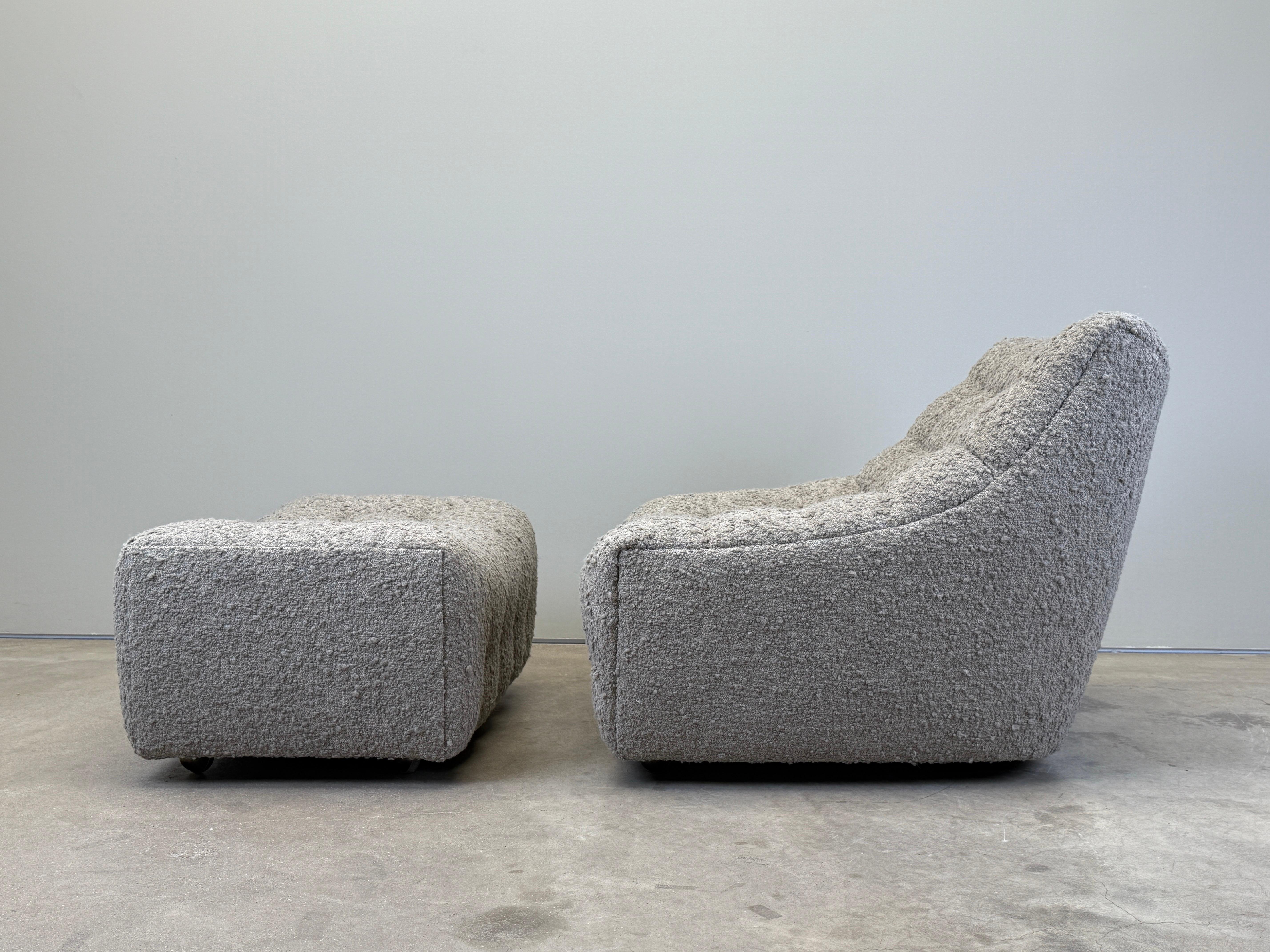 A lounge chair and ottoman on casters, designed by Milo Baughman for Thayer Coggin. Fully restored and upholstered in Holly Hunt / Los Cabos / Steam fabric. 

Chair: 34w x 36d x 31h
Ottoman: 33w x 22d x 15h