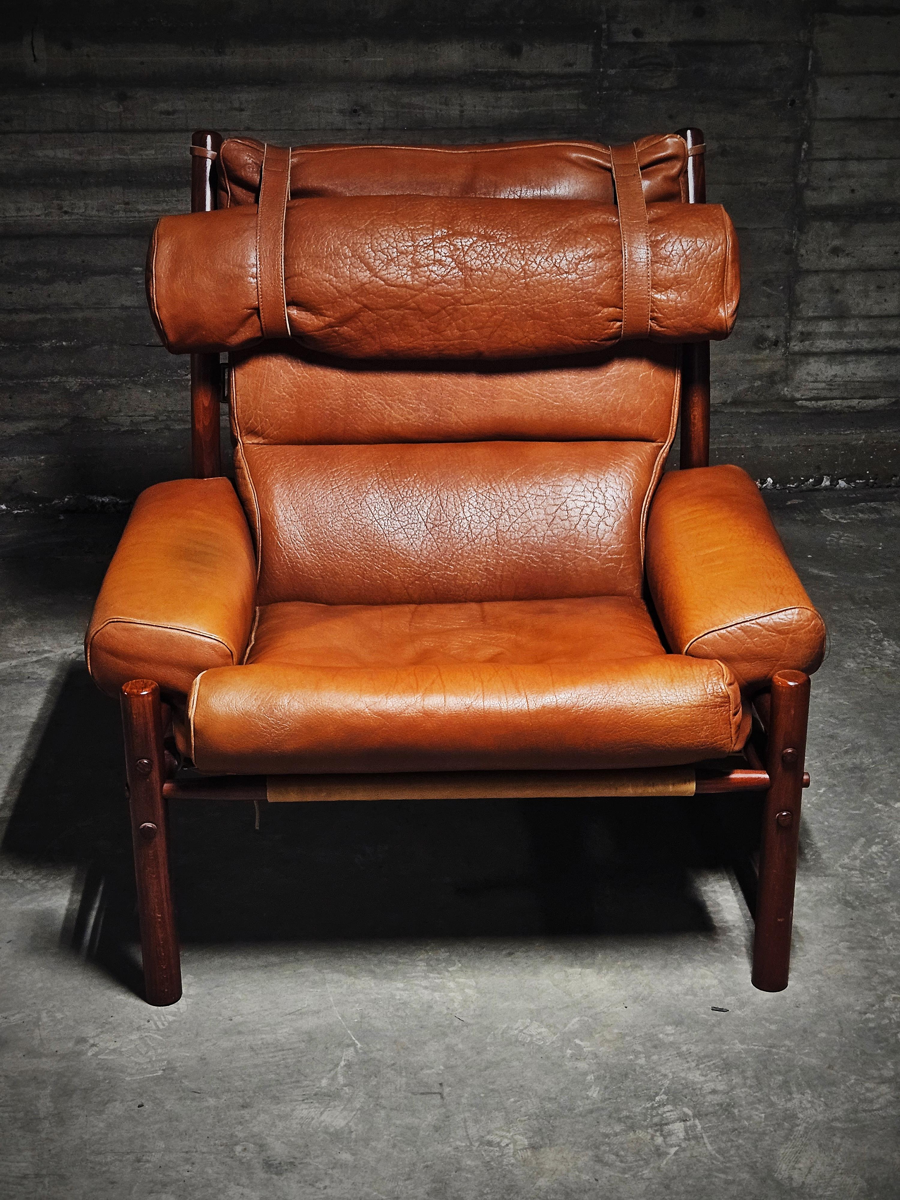 Arne Norell, 'Inca' lounge chair with ottoman, cognac leather and beech. Produced by his own firm in the middle of the 20th century. 

The design is luxurious with its generous proportions. It is also very comfortable. 

Very good vintage condition