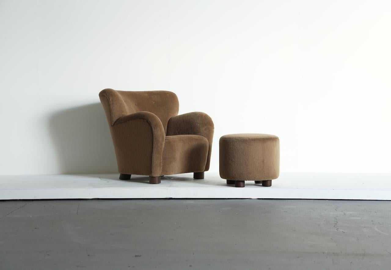 A modern lounge chair and ottoman.  Beech frames and sprung seat.  Upholstered in a premium, soft, pure alpaca wool fabric with solid oak feet.  Handmade in England.  Pairs are also available - please see final photographs and our other listings.  