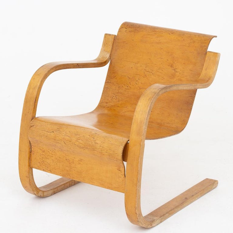 Model 31 - Lounge chair in bent, veneered masur birch. Designed in the 1930s. Maker Huonekalutehdas Korhonen Oy.
 