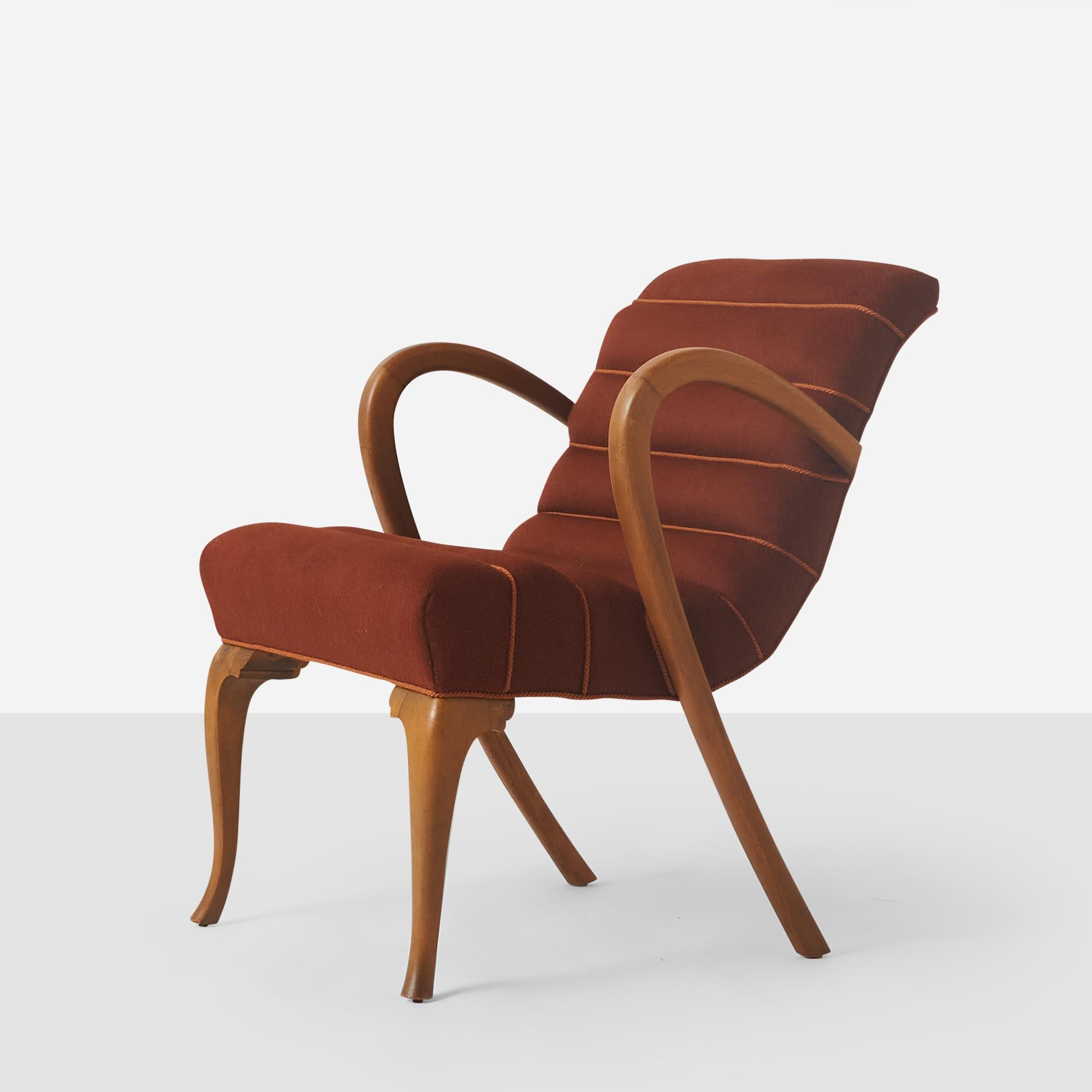 A beech framed armchair by Axel Larsson. The frame has been lightly restored. Recovered in a Sandra Jordan Prima Alpaca Brandy fabric with horizontal piping.