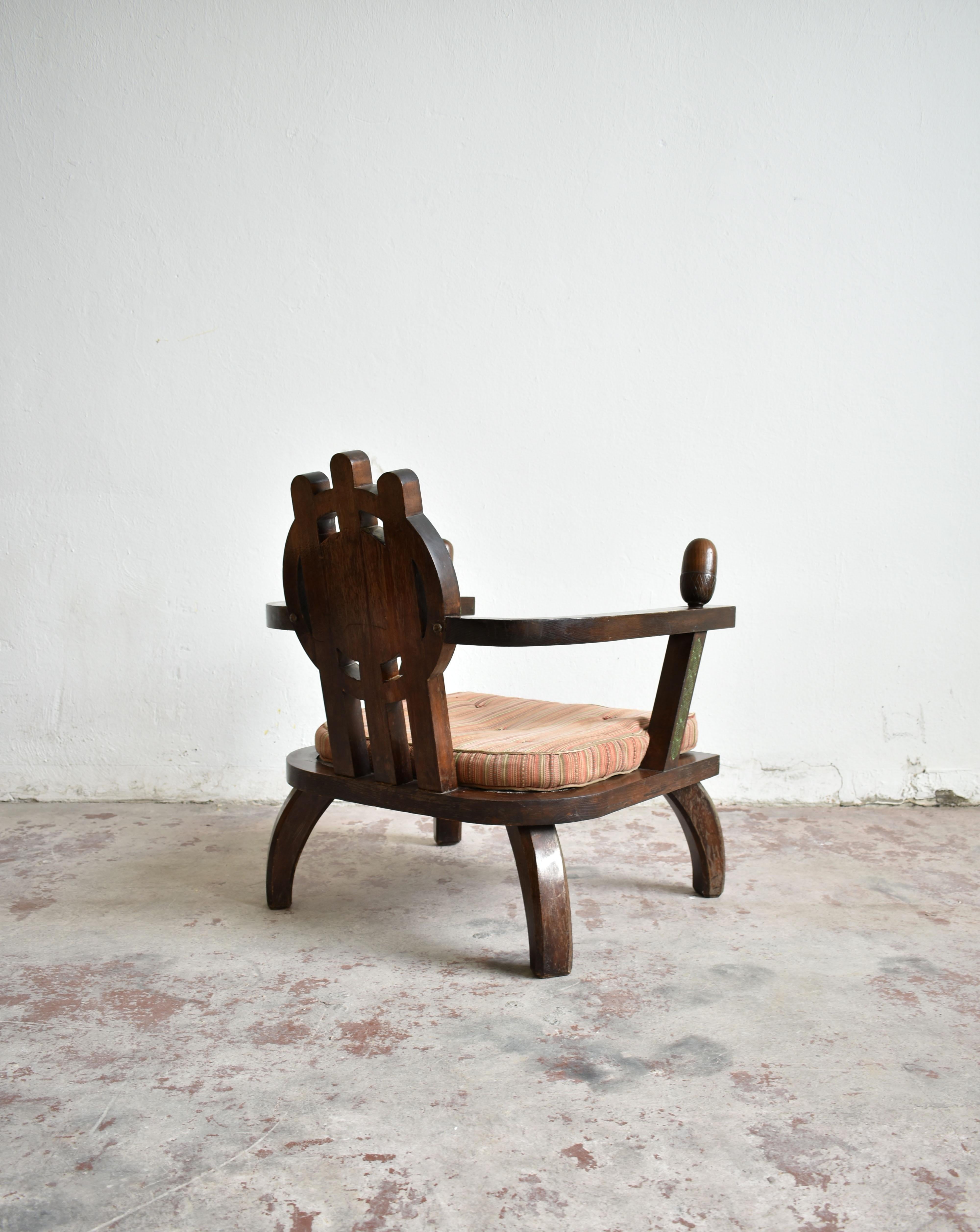 20th Century Lounge Chair by Ettore Zaccari, Oak with Carved Details, Italy, 1910