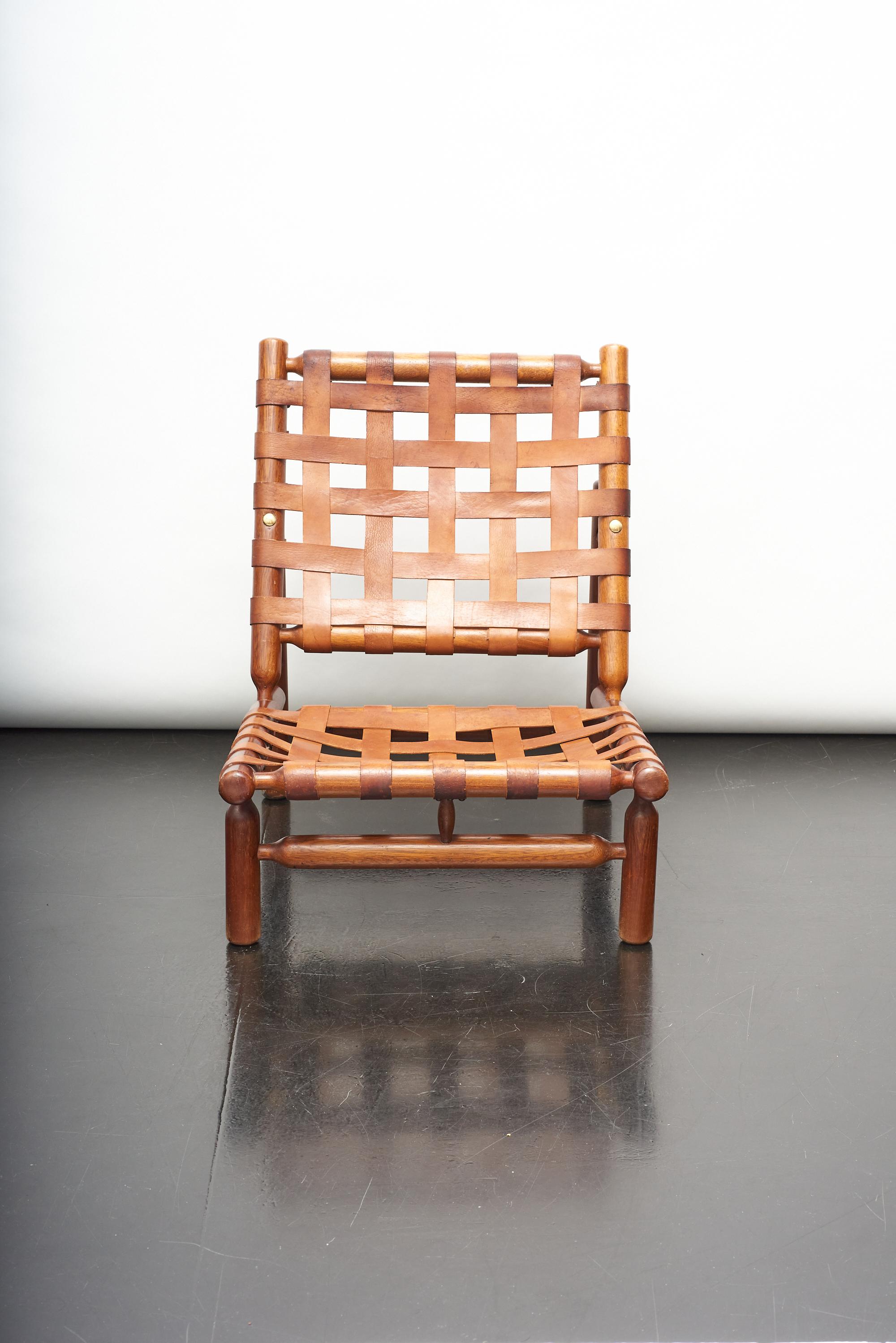 This lounge chair,designed by Ilmari Tapiovaara for Paolo Arnaboldi, was a commission of La Permanente Mobili Cantù, Italy 1957. This design premiered at the 'Seconda Mostra Selettiva e Concorso Internazionale del Mobile’ in Cantù Italy in 1957
