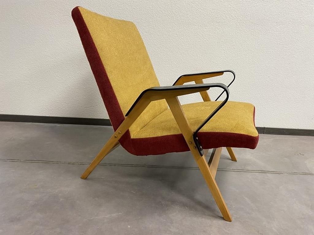Lounge chair by František Jirák for Tatra Nábytok Pravenec in 1960s. Armchair is professionally stained and repolished with new fabric.