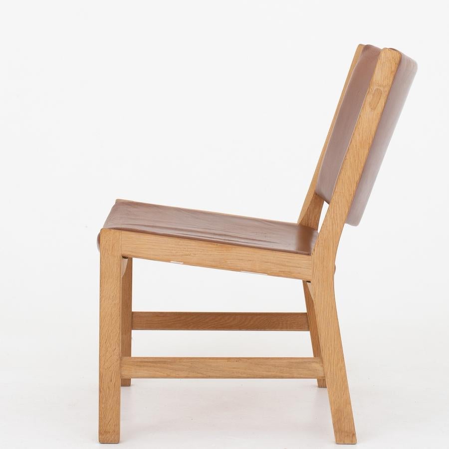AP 54 - rare lounge chair in oak with brown leather. Maker AP Stolen.