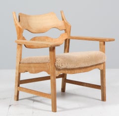 Lounge Chair by Henning Kjærnulf, Oak & Shearling, 1970s Denmark