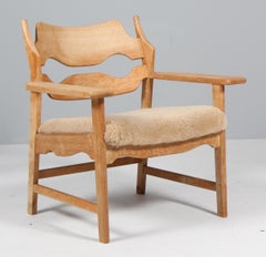 Sedia da salotto di Henning Kjærnulf, Oak e Shearling, Danimarca, anni '70