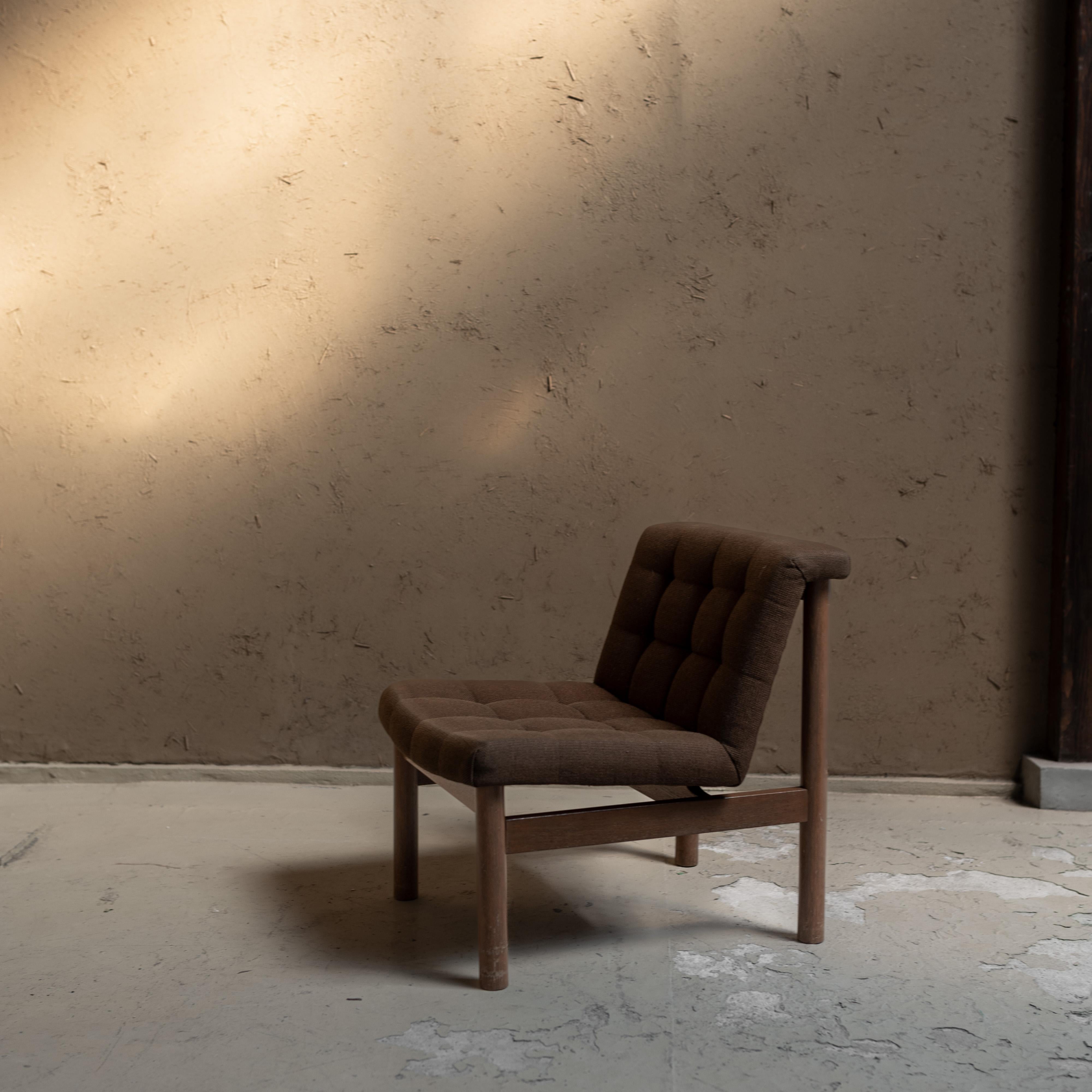 A beautiful  lounge chair by the Japanese designer Katsuhei Toyoguchi manufactured by Tendo Mokko in 1980s, Japan.

A representative of a rare collection, featuring wood and fabric finishes. Truly, it offers comfort and beauty in every detail of its